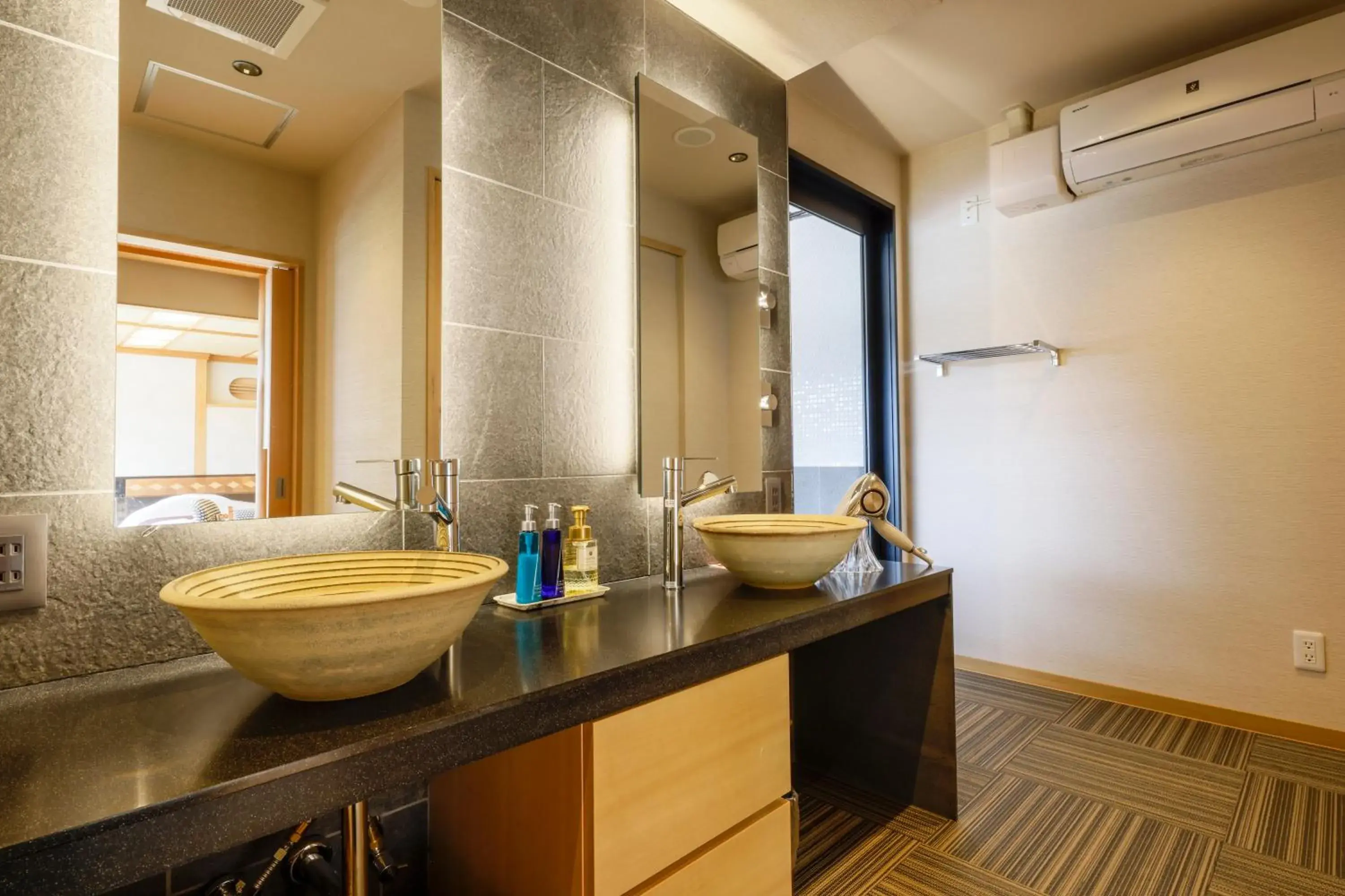 Bathroom in Kawaguchiya Kinosaki Riverside Hotel Bathroom in Kawaguchiya Kinosaki Riverside Hotel