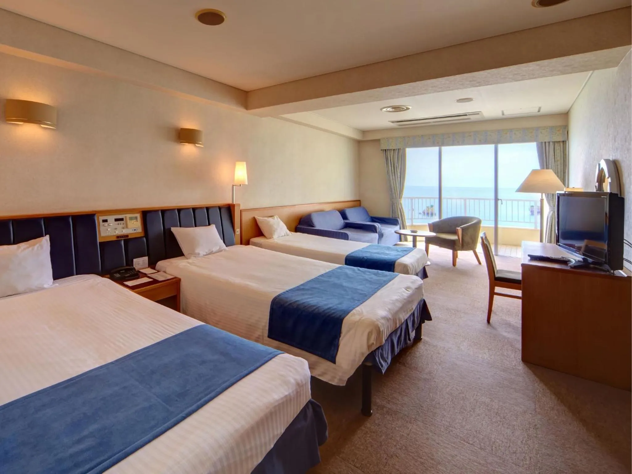 Photo of the whole room, Bed in Hotel Resonex Nago
