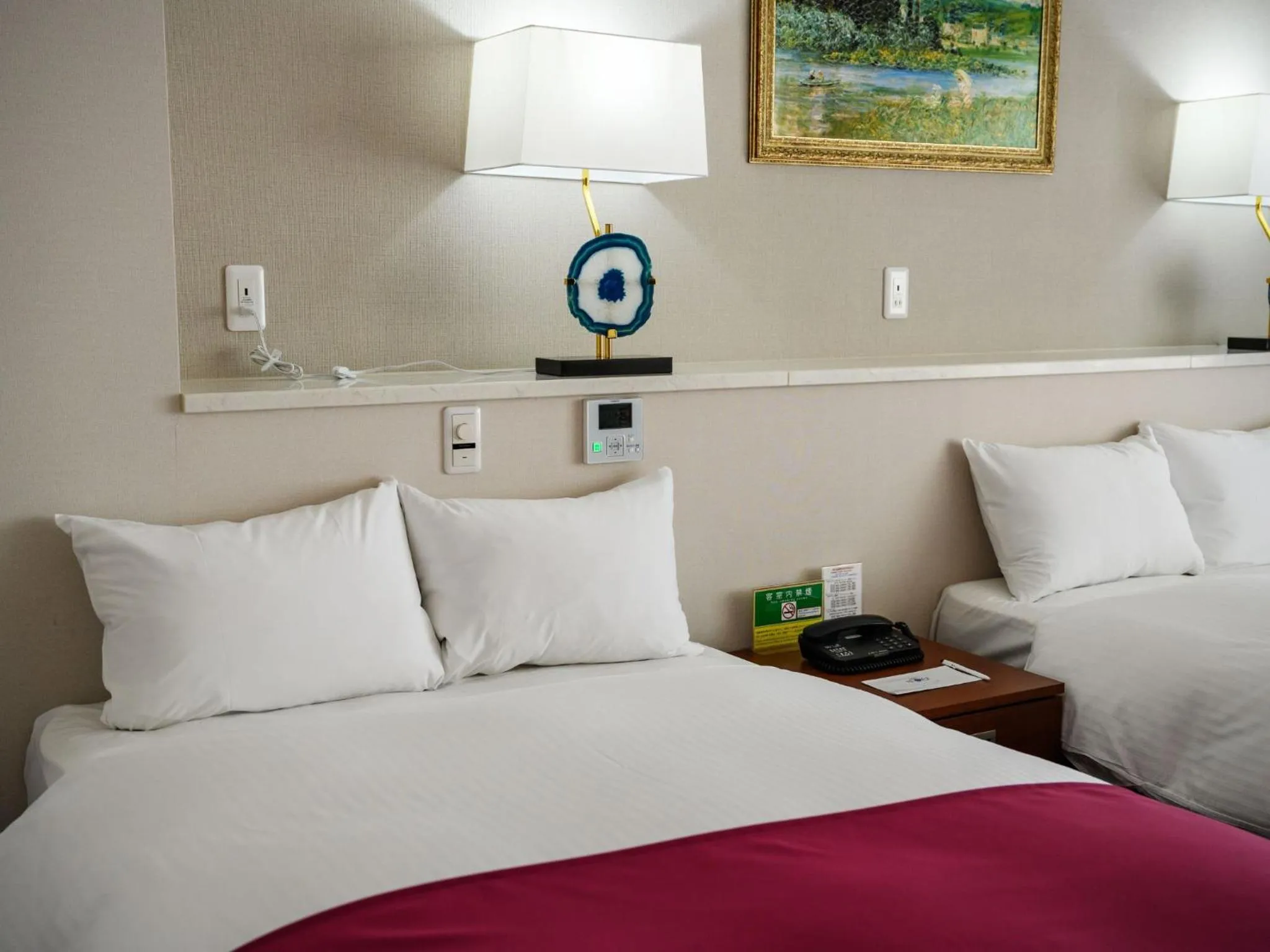 Bed in Hotel Resonex Nago