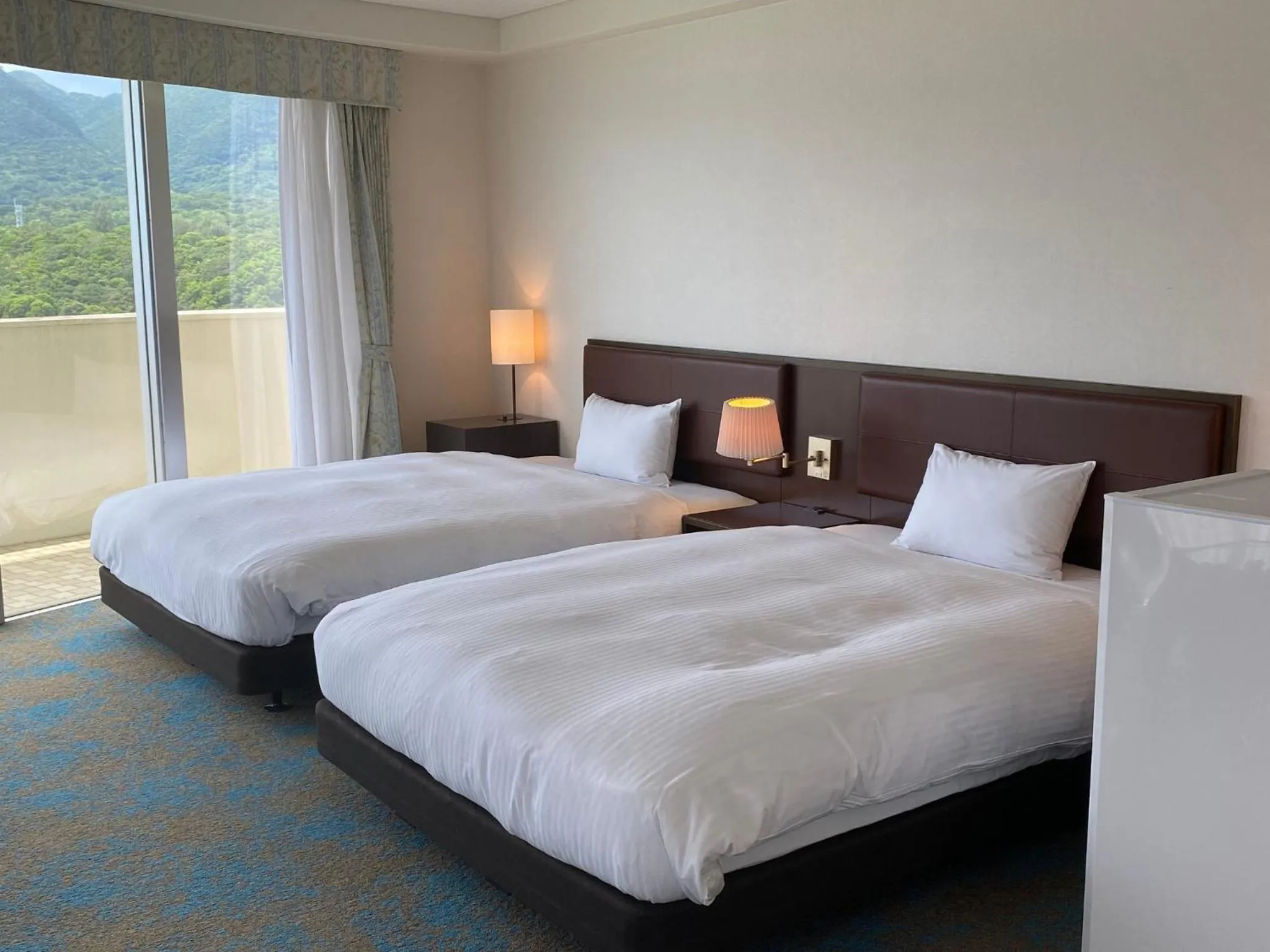 Bed in Hotel Resonex Nago