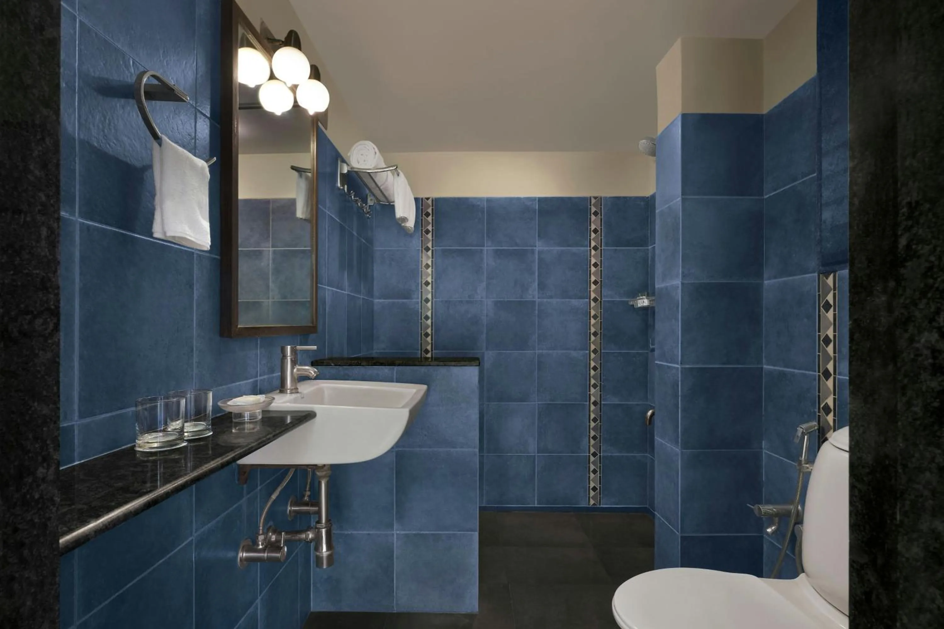 Bathroom in The Fern Samali Resort Dapoli, Series by Marriott