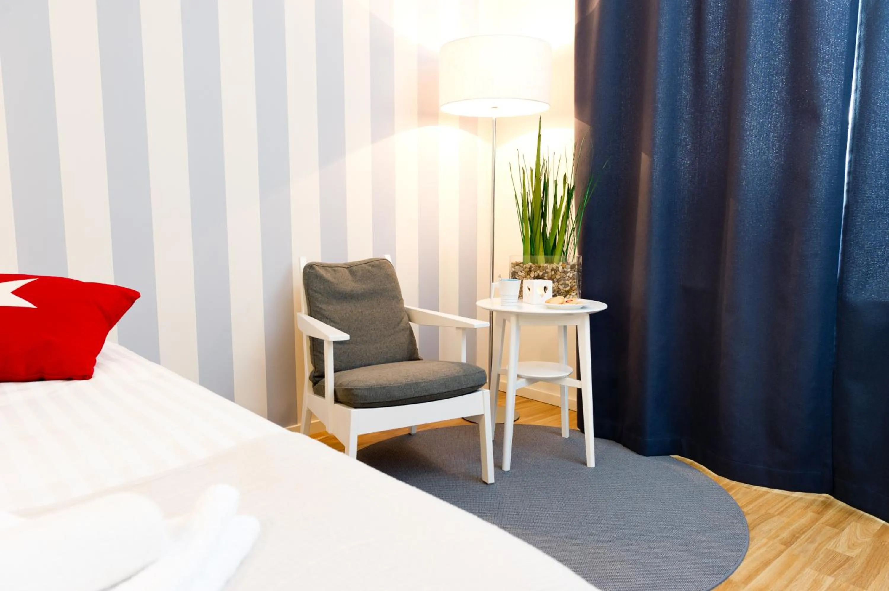 Living room, Bed in Attendo Park Hotell