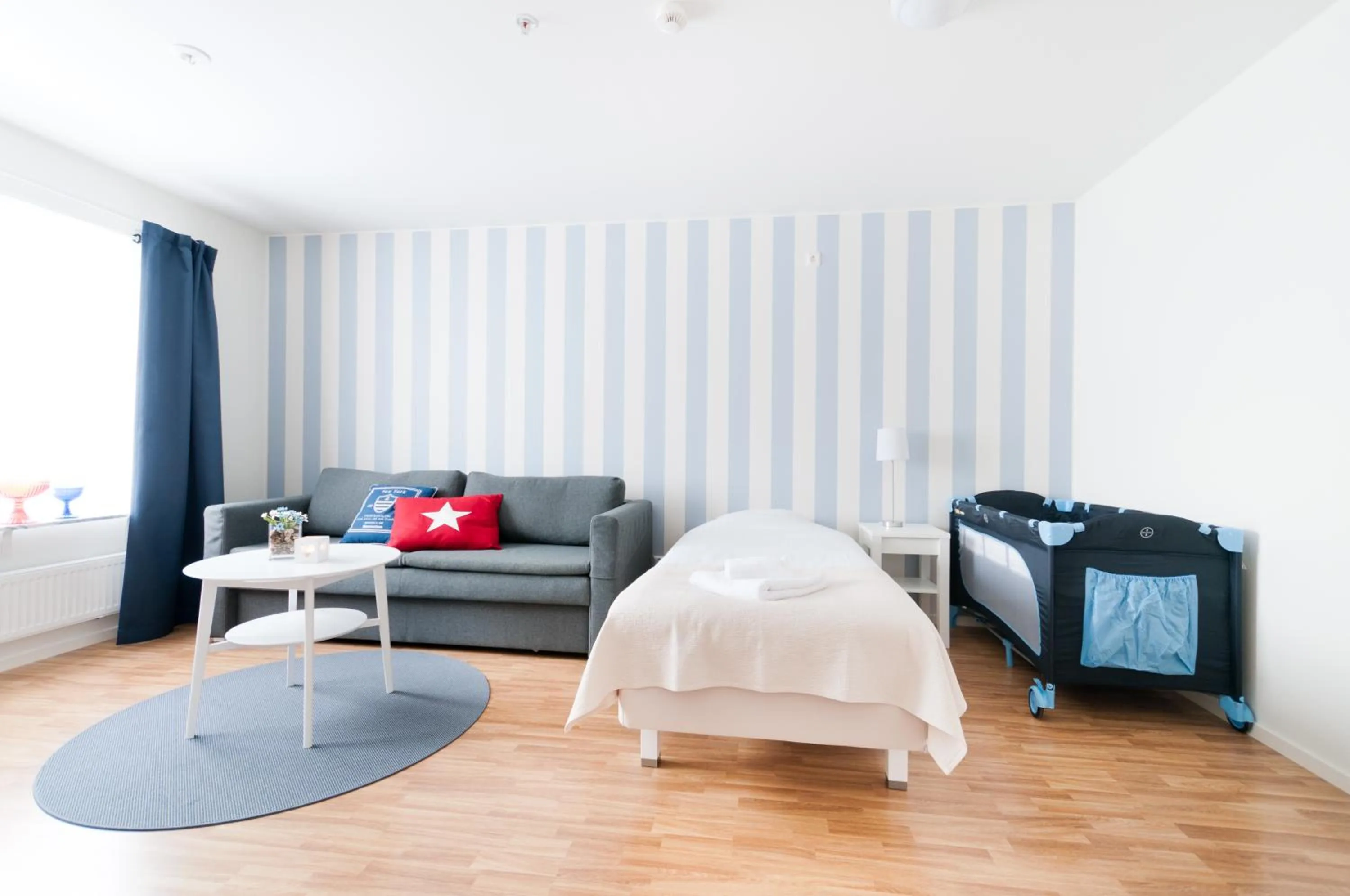 Living room, Bed in Attendo Park Hotell