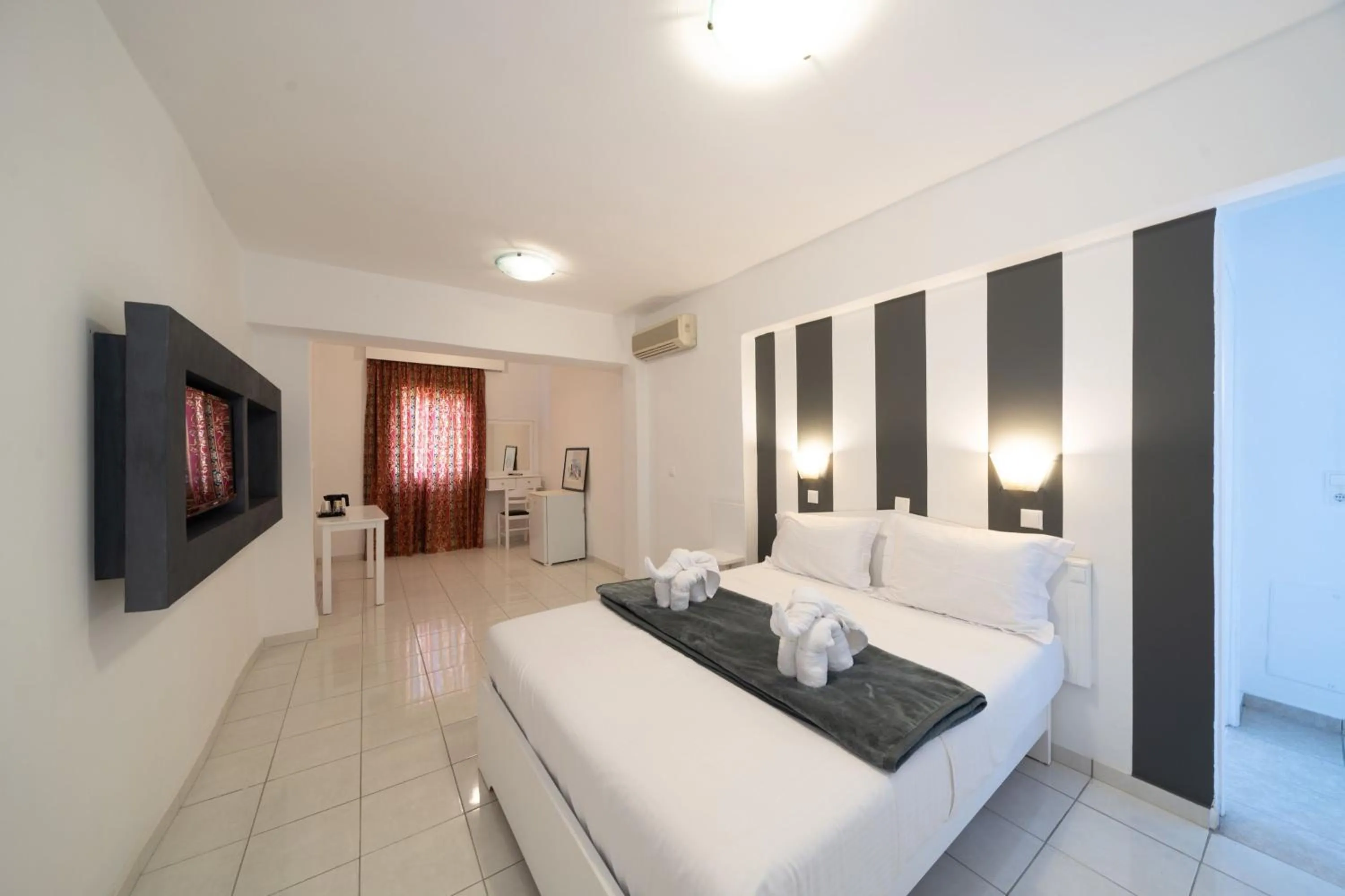 Bed in ILIOS K Village Resort