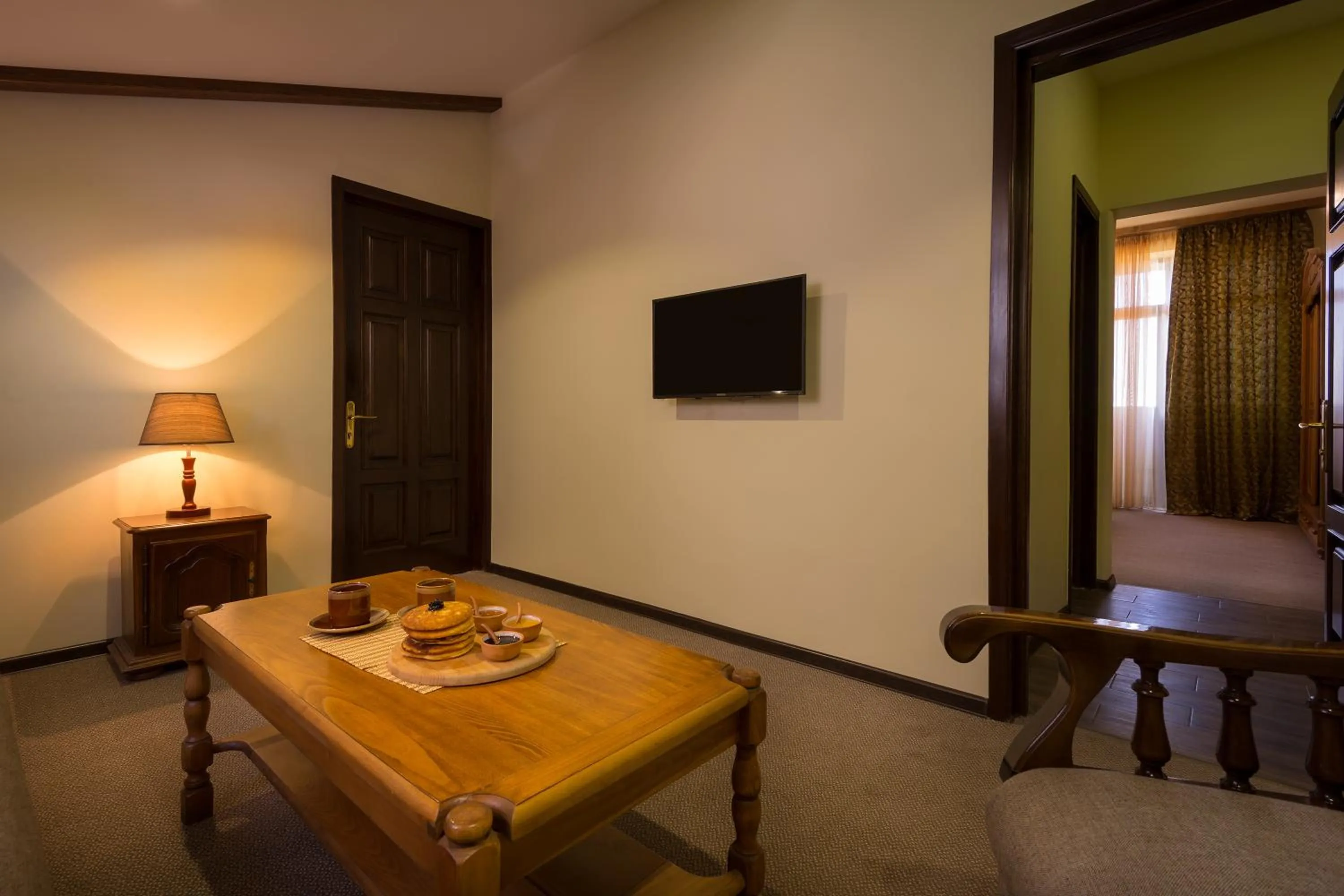 Living room in Olympia Garden Hotel