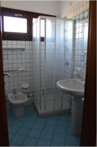 Bathroom in Residence Il Borgo di Porto Corallo