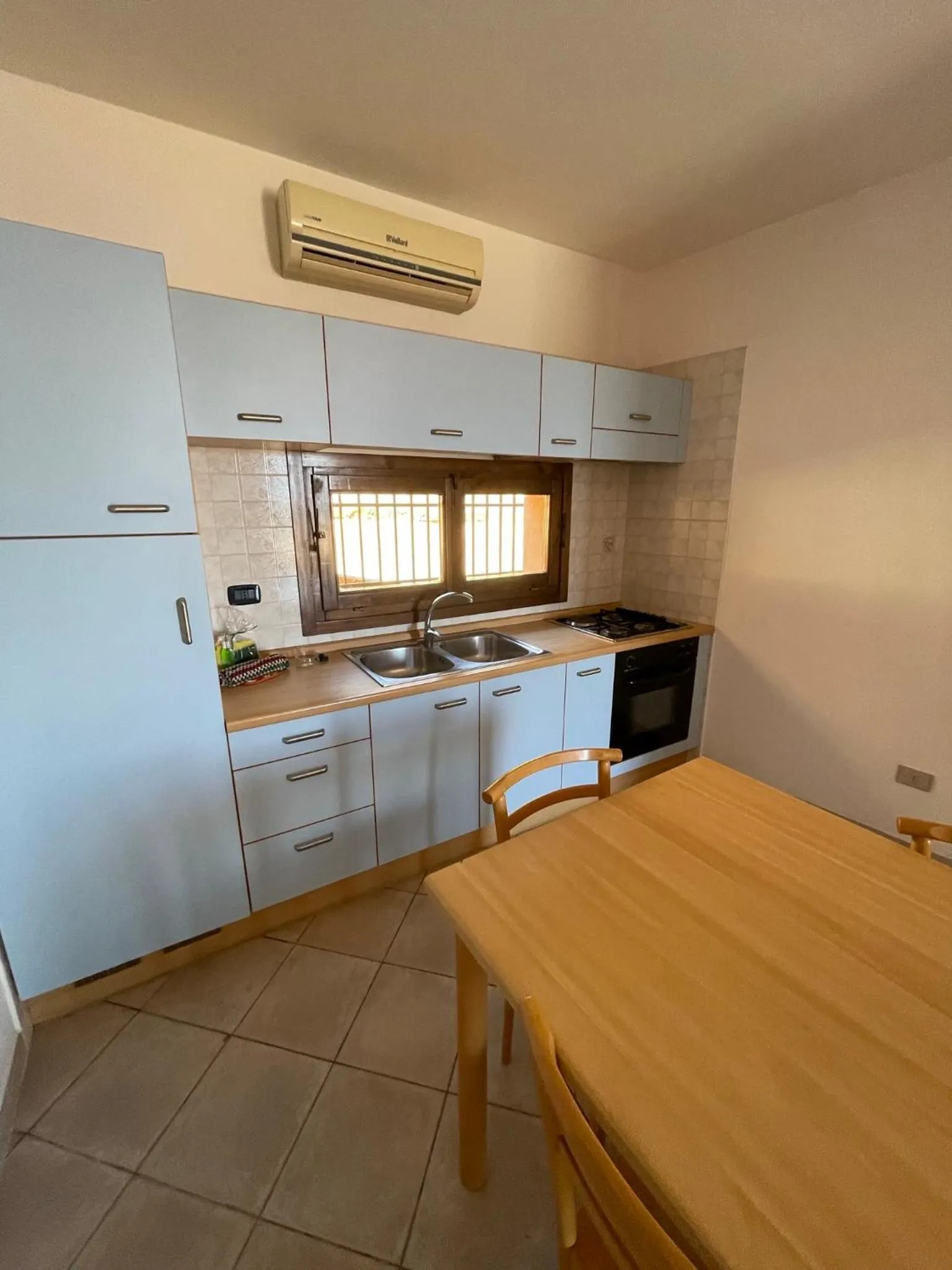Kitchen or kitchenette in Residence Il Borgo di Porto Corallo