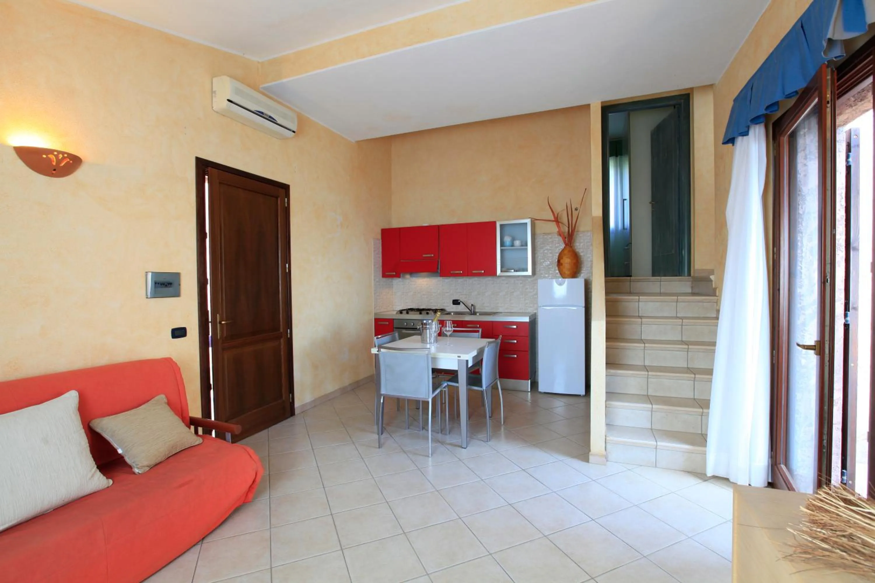 Kitchen or kitchenette in Residence Il Borgo di Porto Corallo