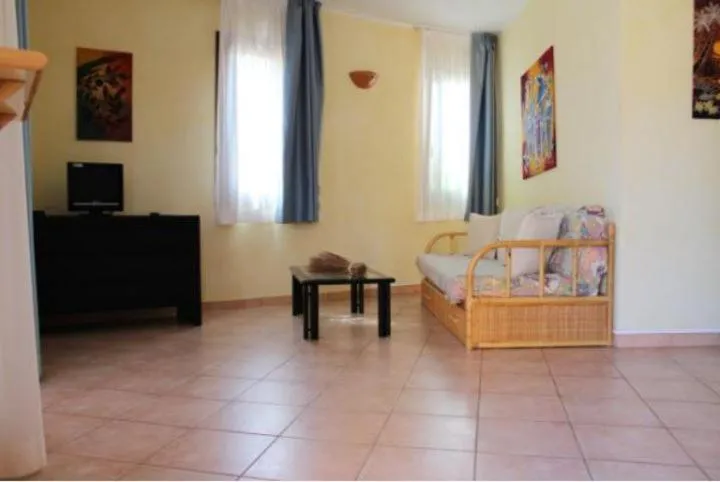 Living room in Residence Il Borgo di Porto Corallo