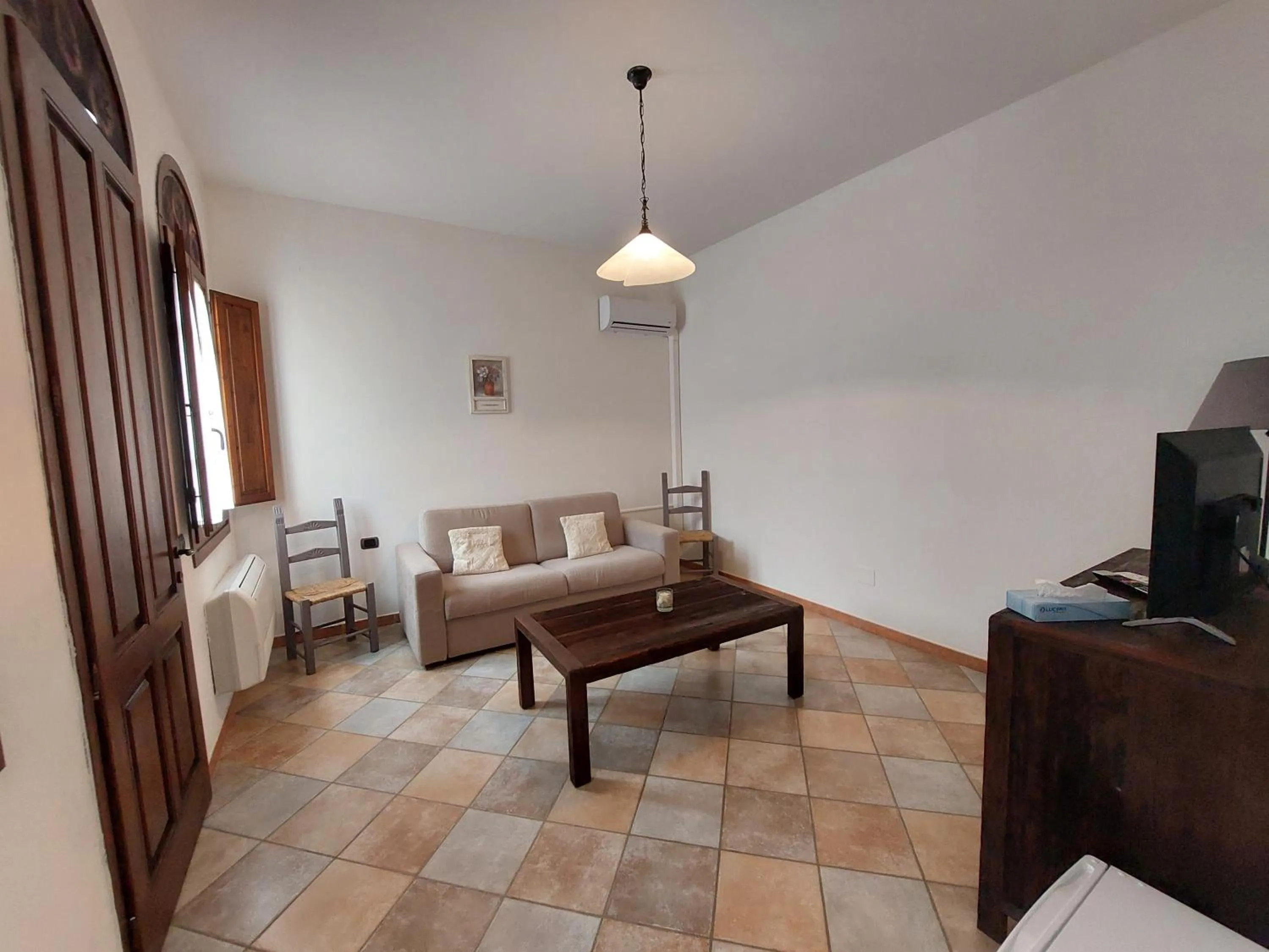 Living room in Hotel La Corte Rosada