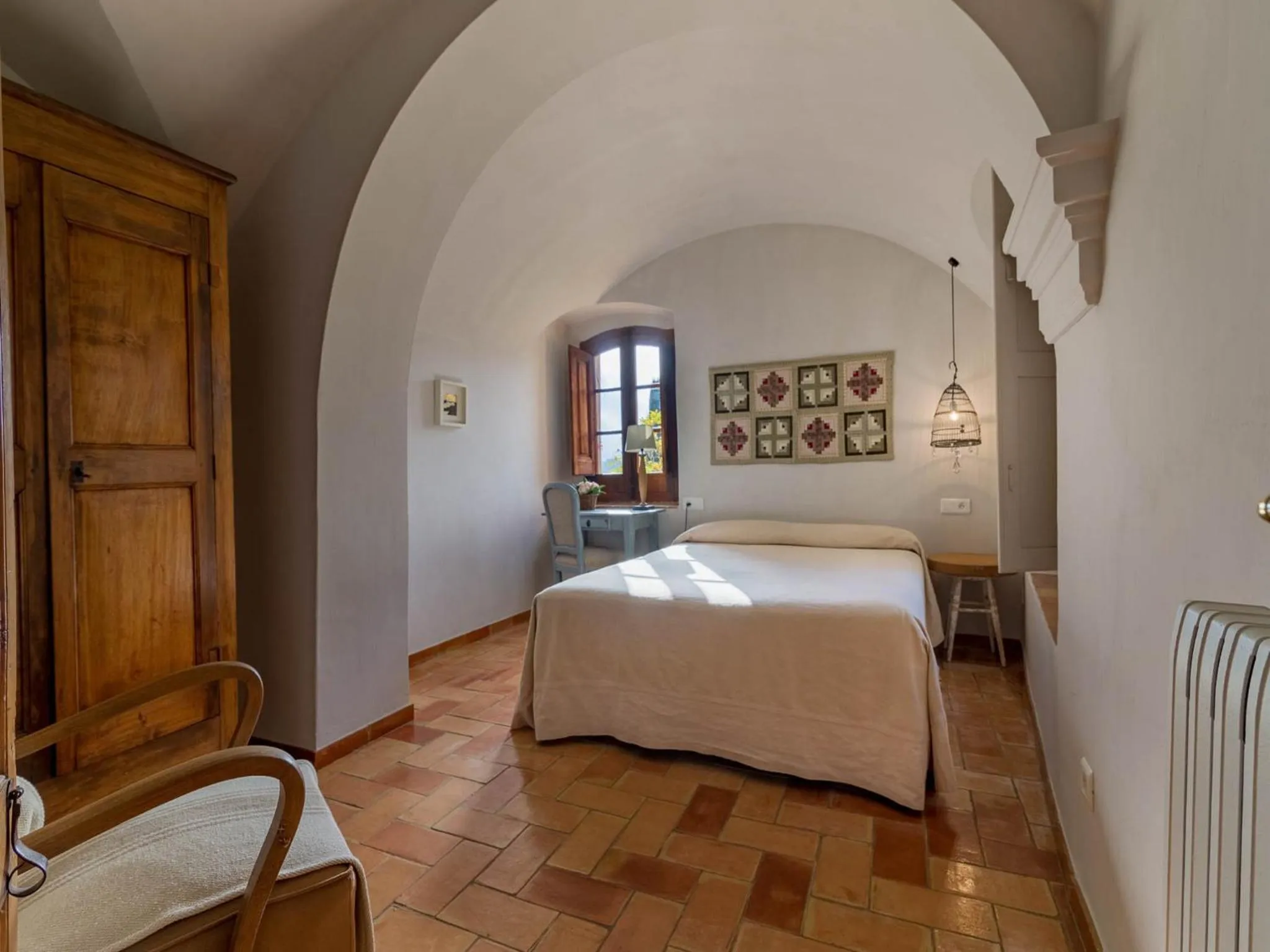 Photo of the whole room, Bed in Hotel la Plaça Madremanya