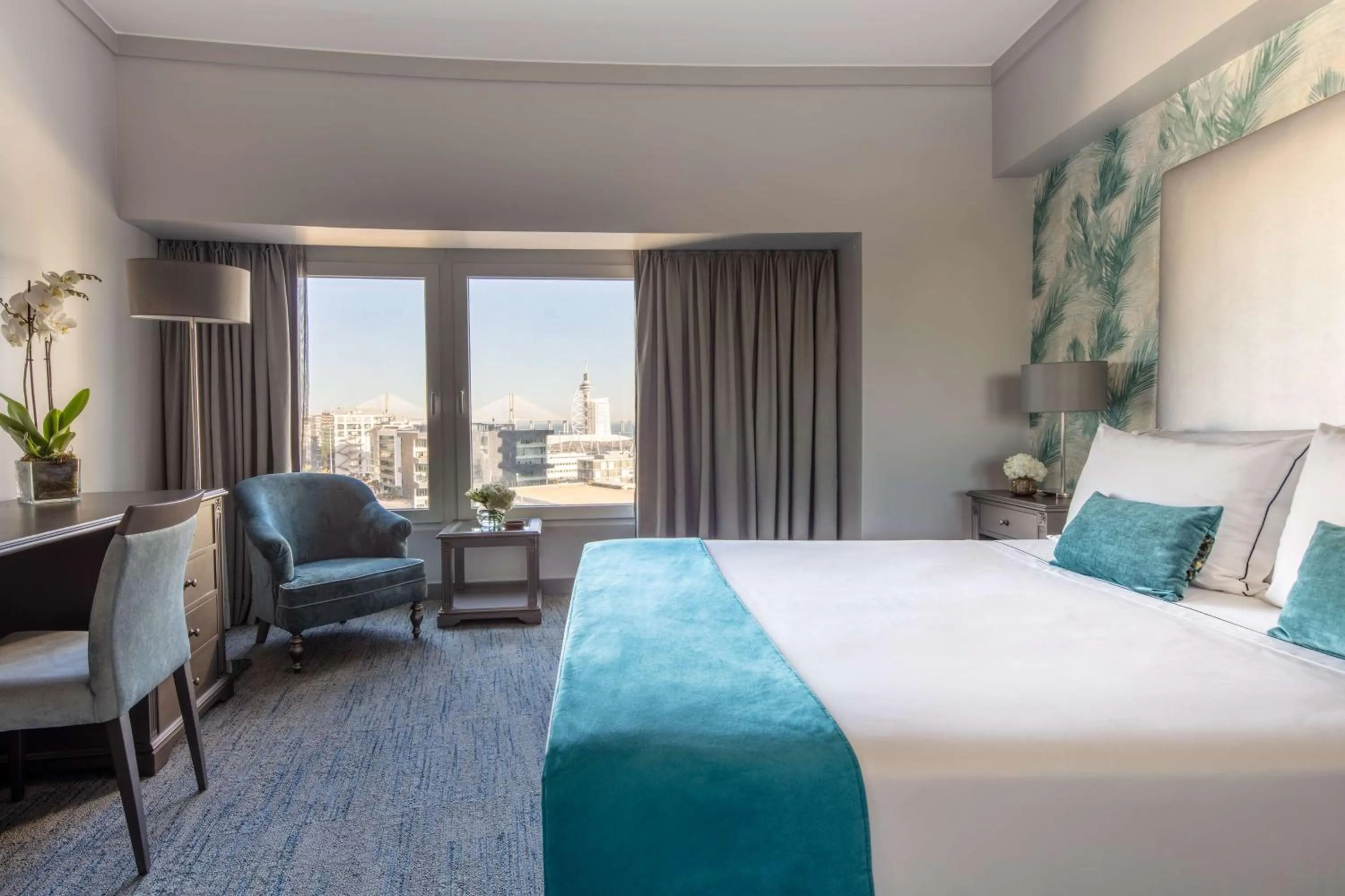 Photo of the whole room, Bed in Tivoli Oriente Lisboa Hotel