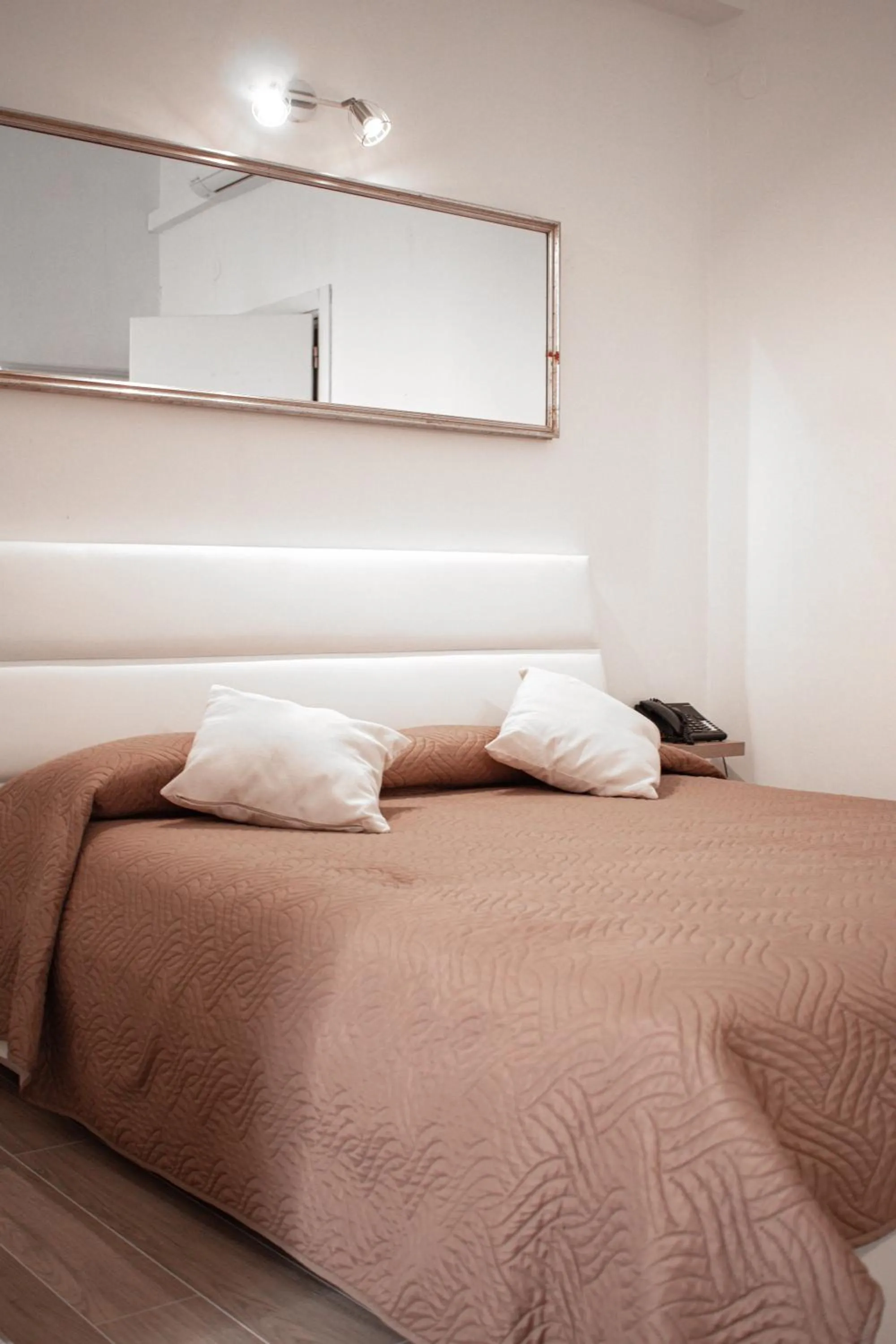 Bed in Hotel Miramare