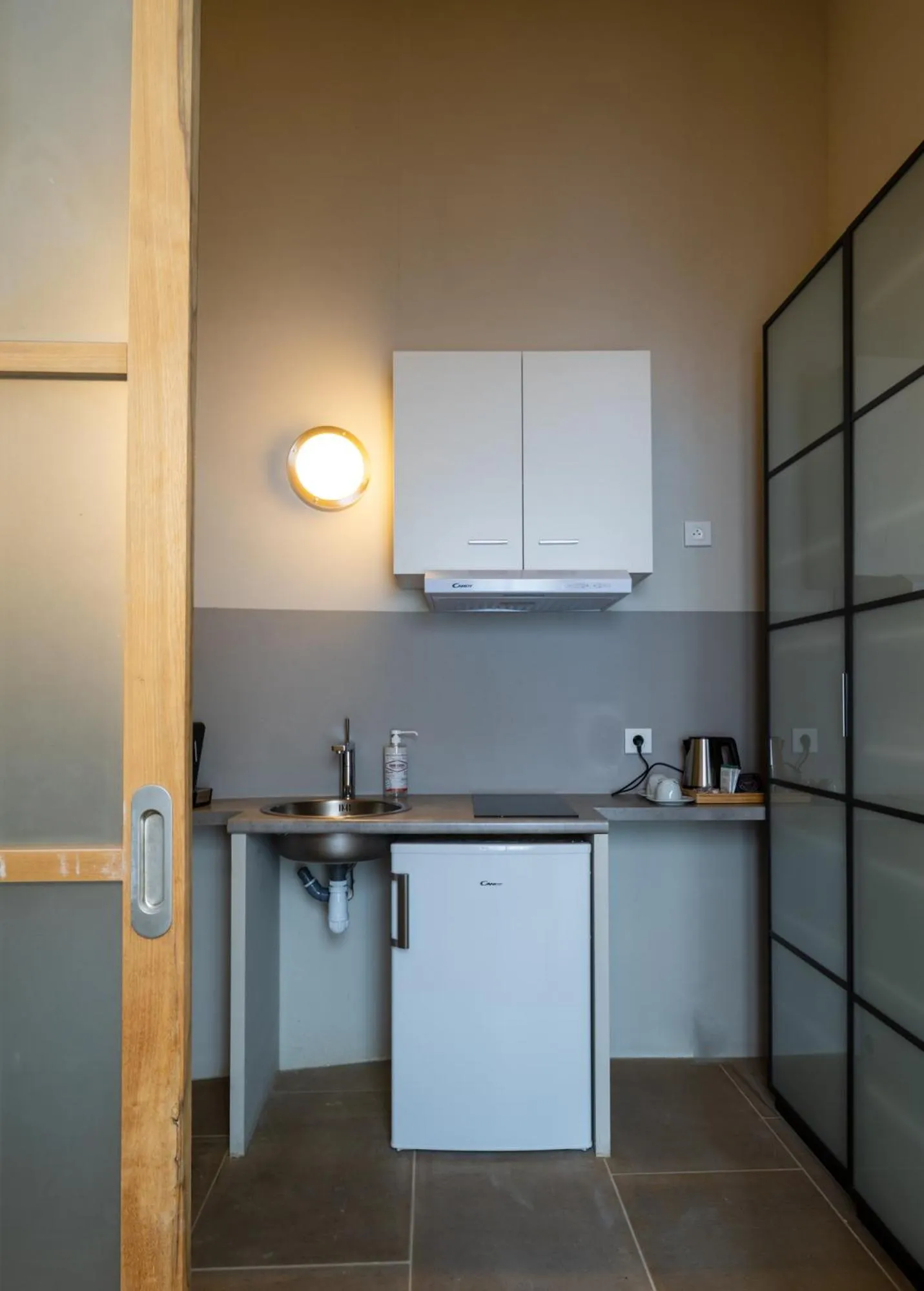 kitchen in Le Clos Violette et Le 11 D'Aglaé - Appart' Hôtel de Charme Design de Luxe