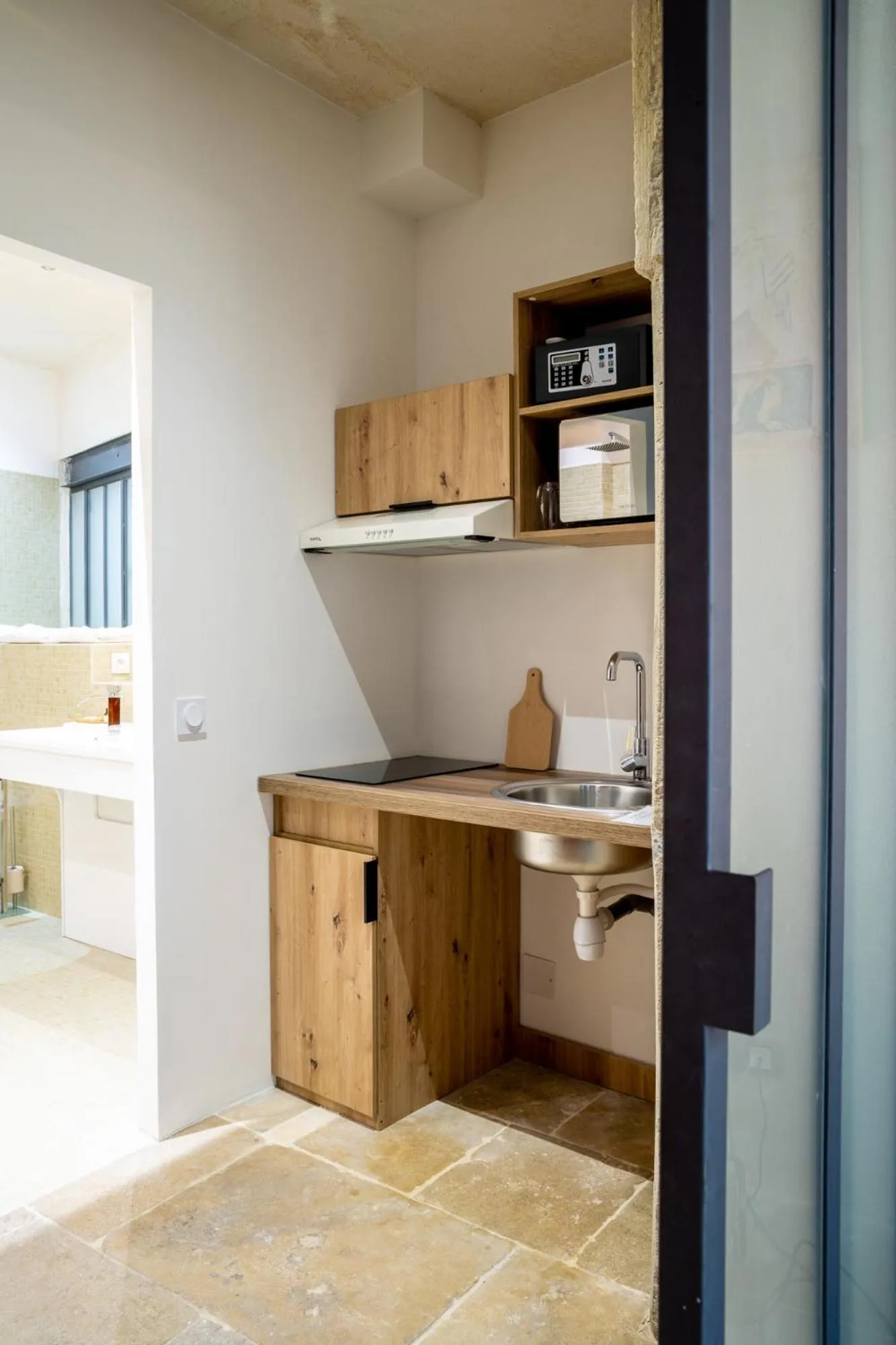 Kitchen or kitchenette in Le Clos Violette et Le 11 D'Aglaé - Appart' Hôtel de Charme Design de Luxe