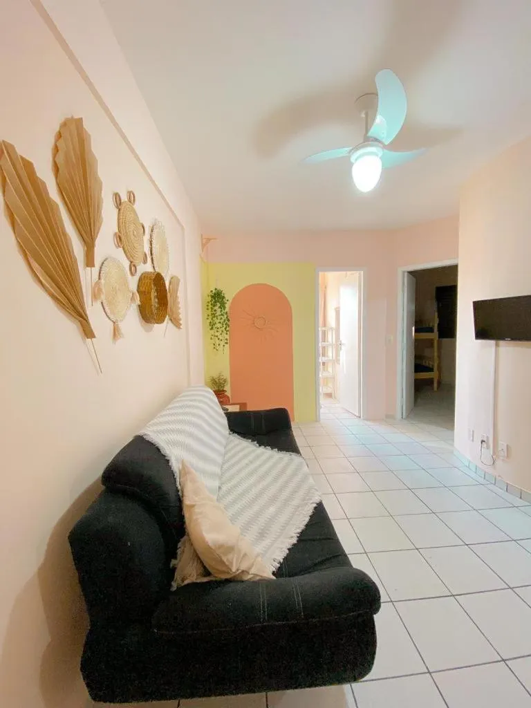 Living room in Apto lindo e aconchegante com piscina 202A