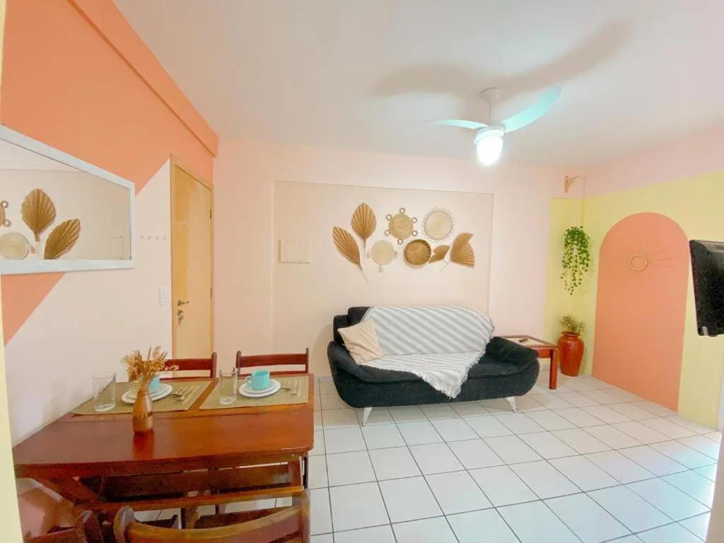 Living room in Apto lindo e aconchegante com piscina 202A