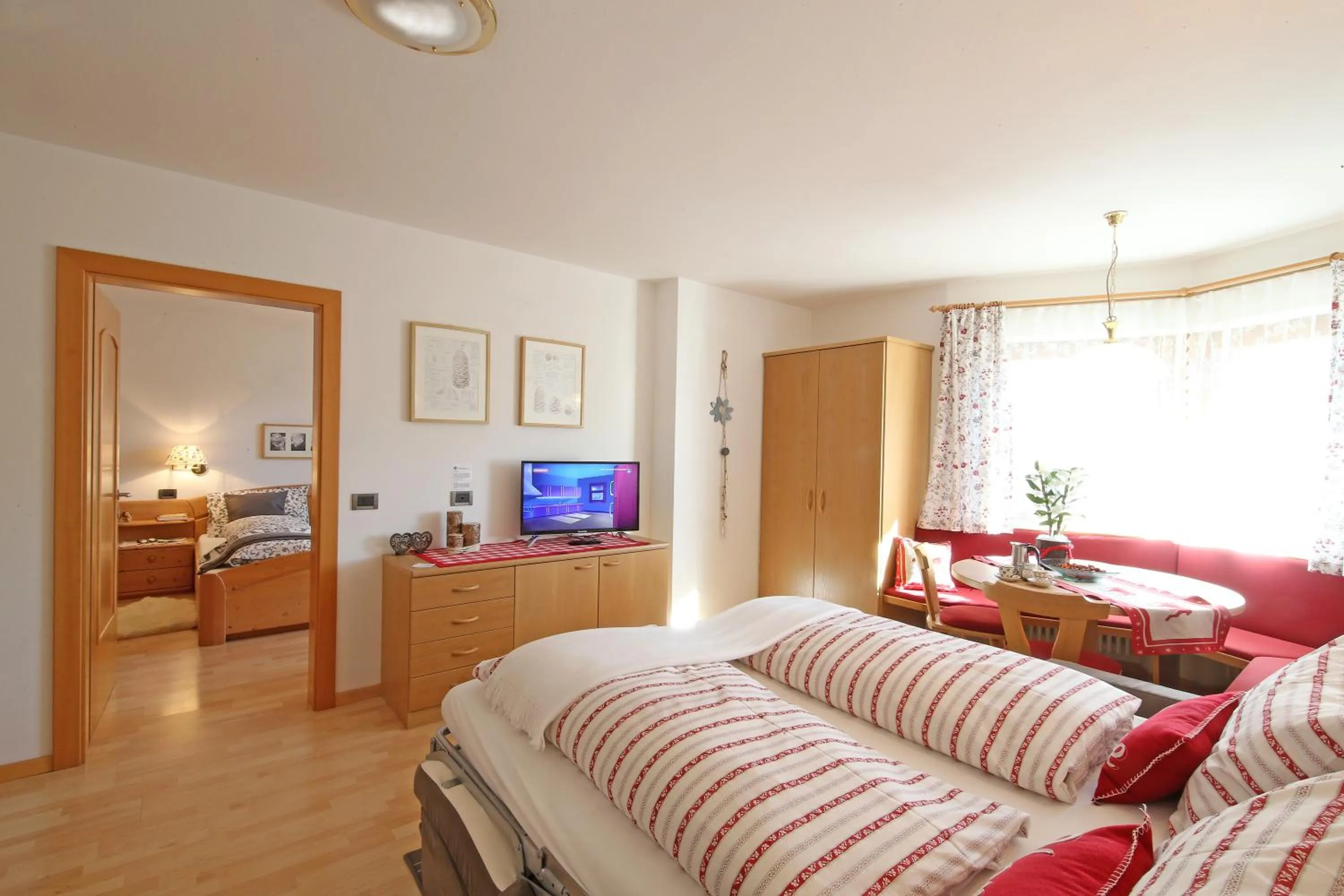 Photo of the whole room, Bed in Ciasa Rudiferia Appartamenti in Alta Badia