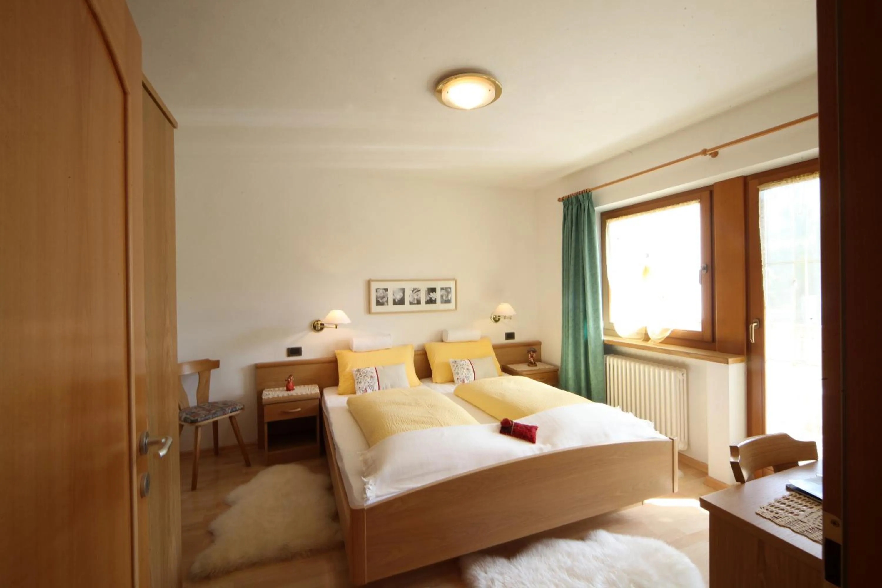Photo of the whole room, Bed in Ciasa Rudiferia Appartamenti in Alta Badia