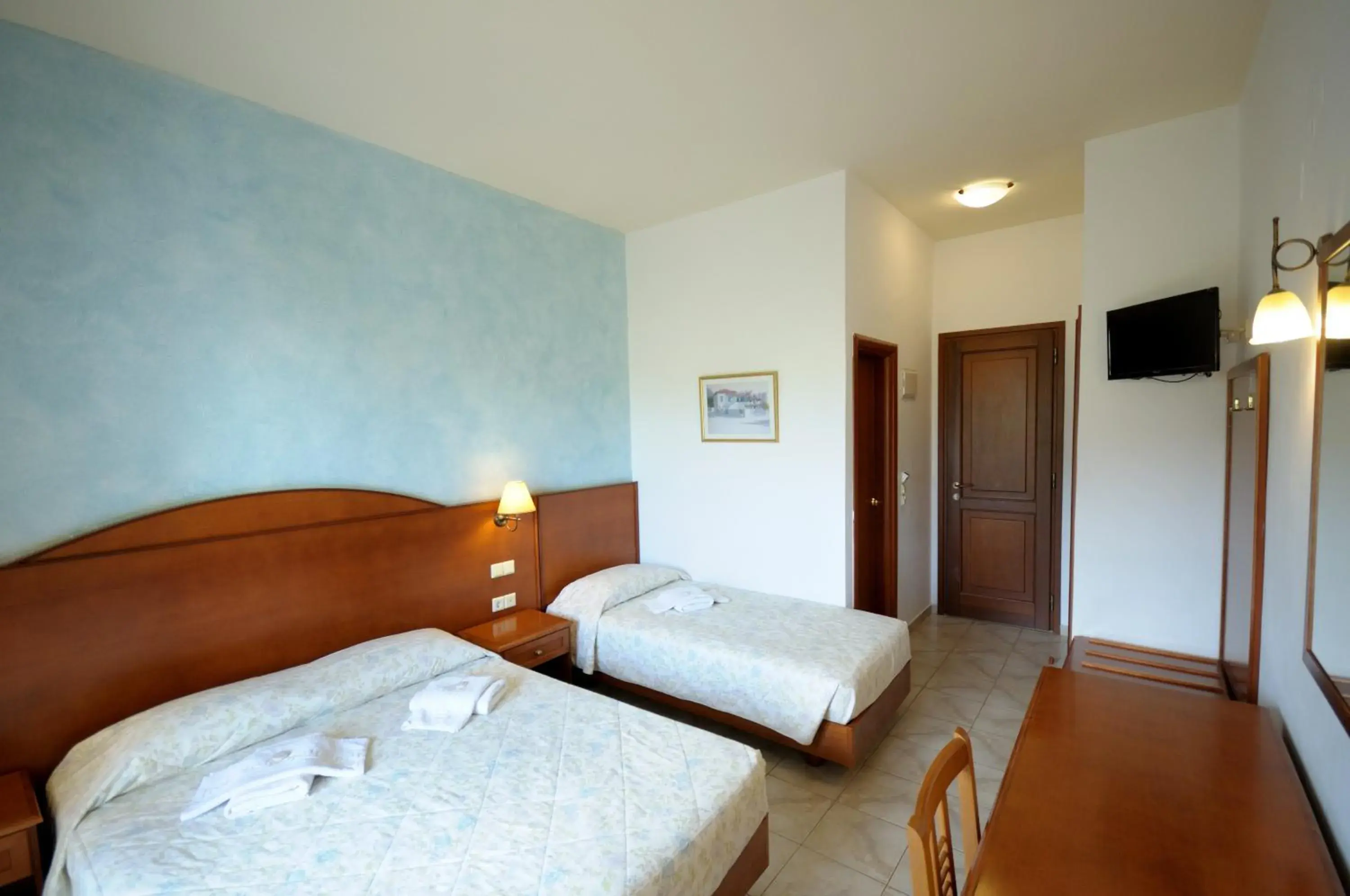 Triple Room in Hotel Marina Village Triple Room in Hotel Marina Village
