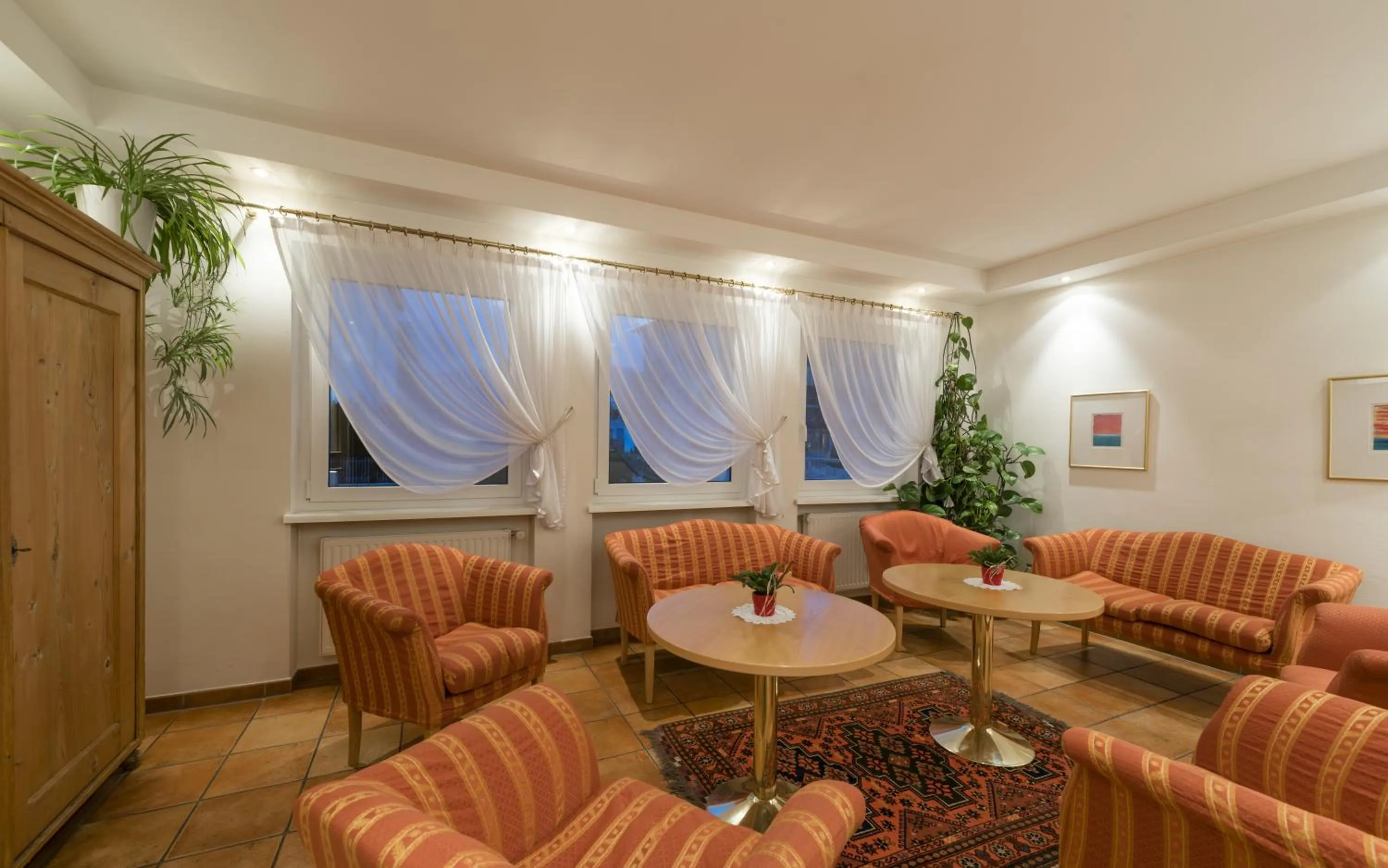 Communal lounge/ TV room in Pension Prack