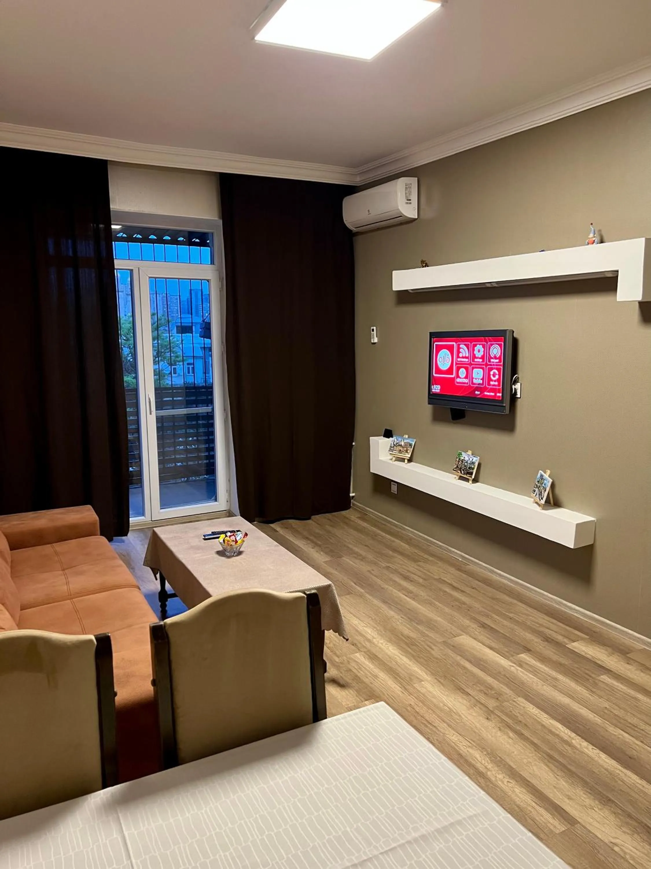 TV and multimedia in Panoramic 2BR Flame Towers View Old City Nizami St