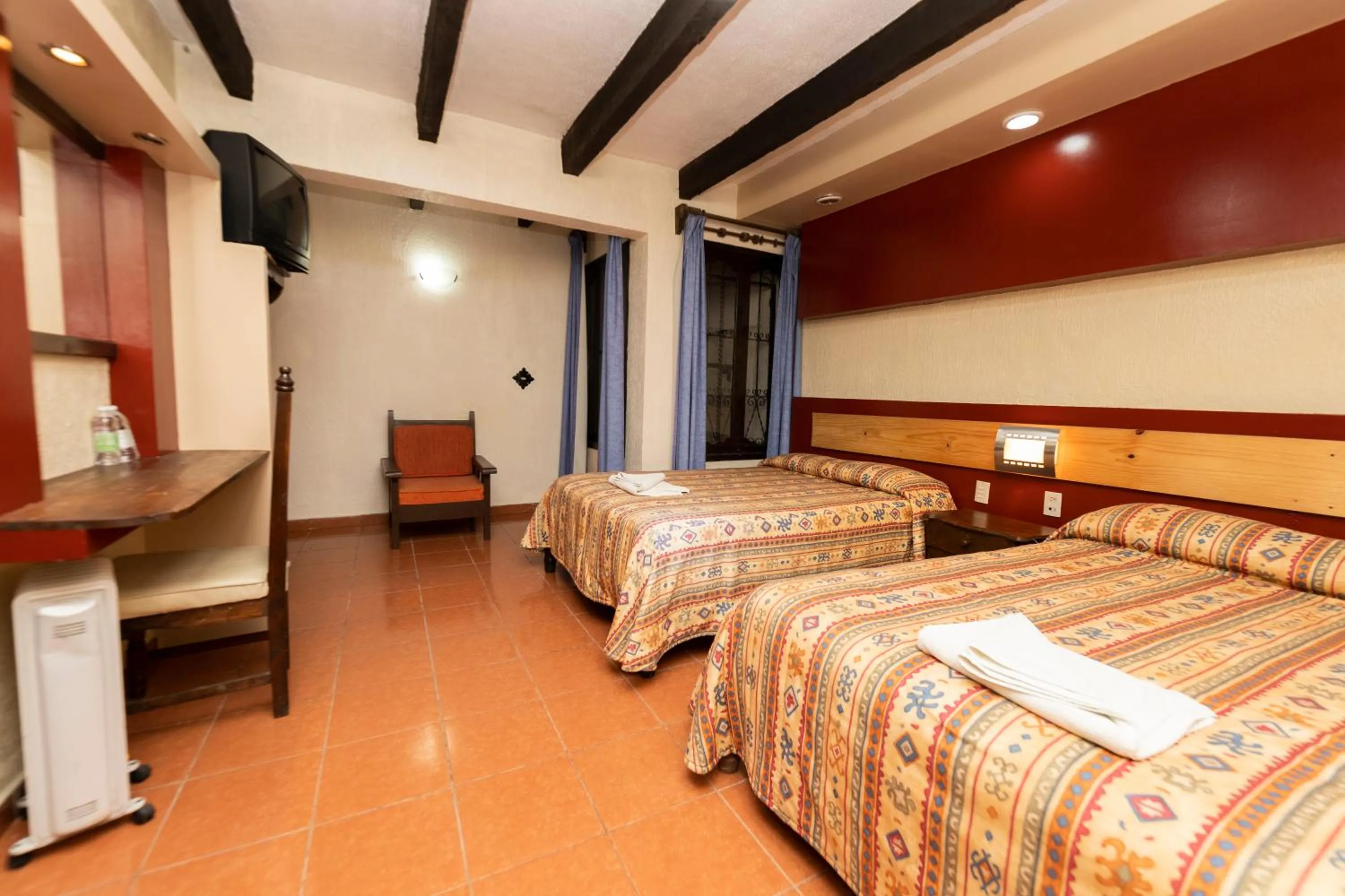 Bed in Hotel Y Villas Vanessa