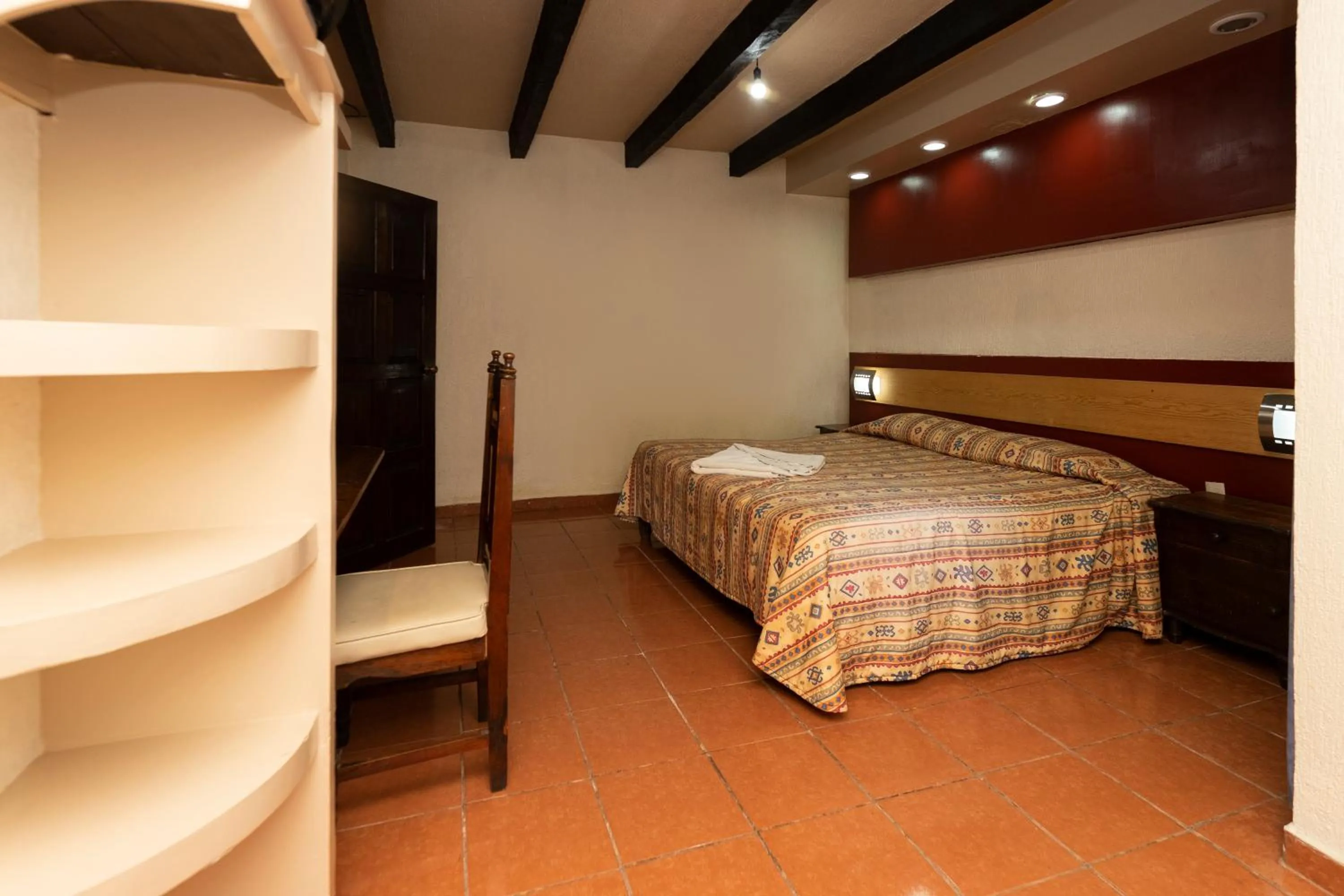 Bed in Hotel Y Villas Vanessa