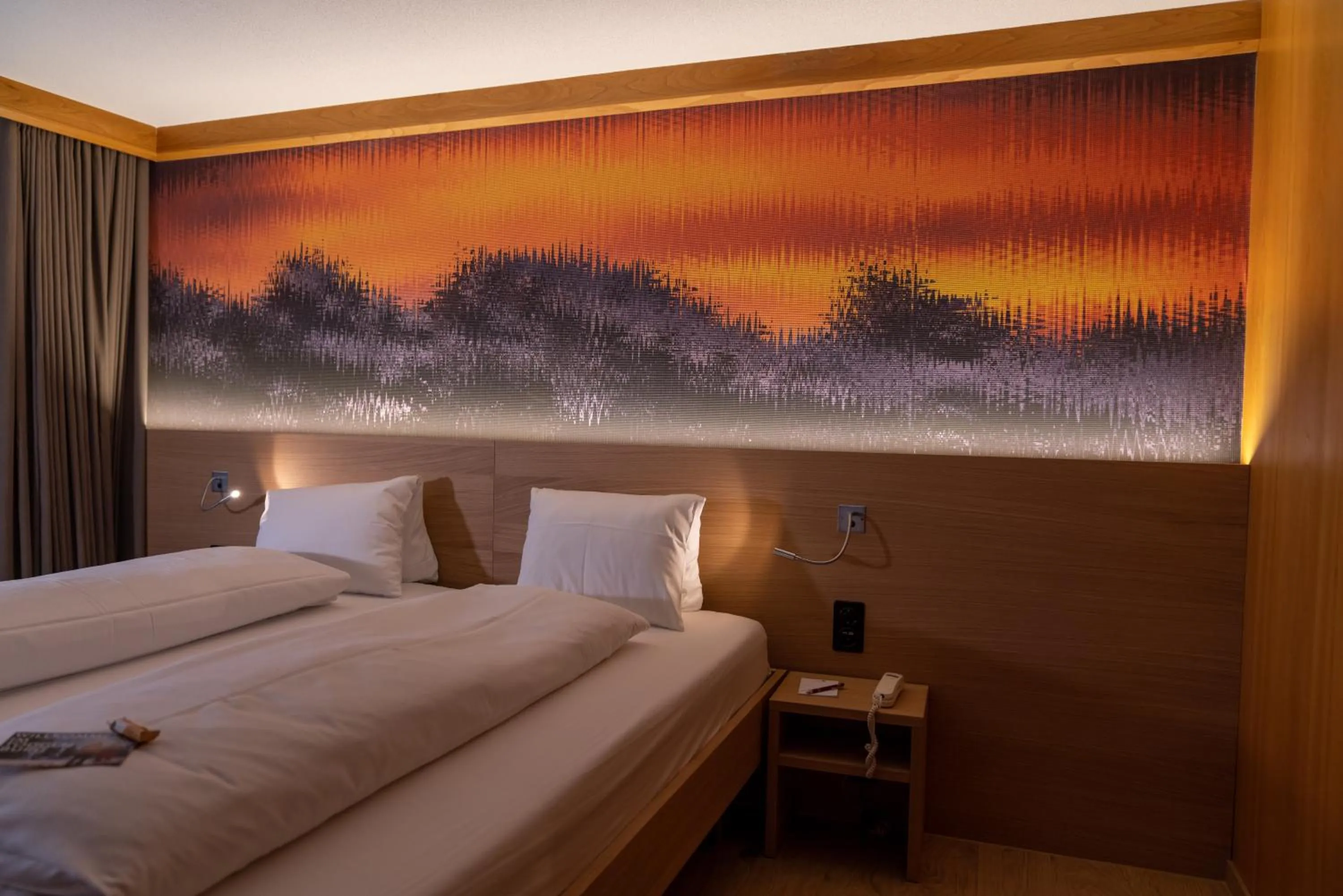 Bed in Hotel Stump's Alpenrose