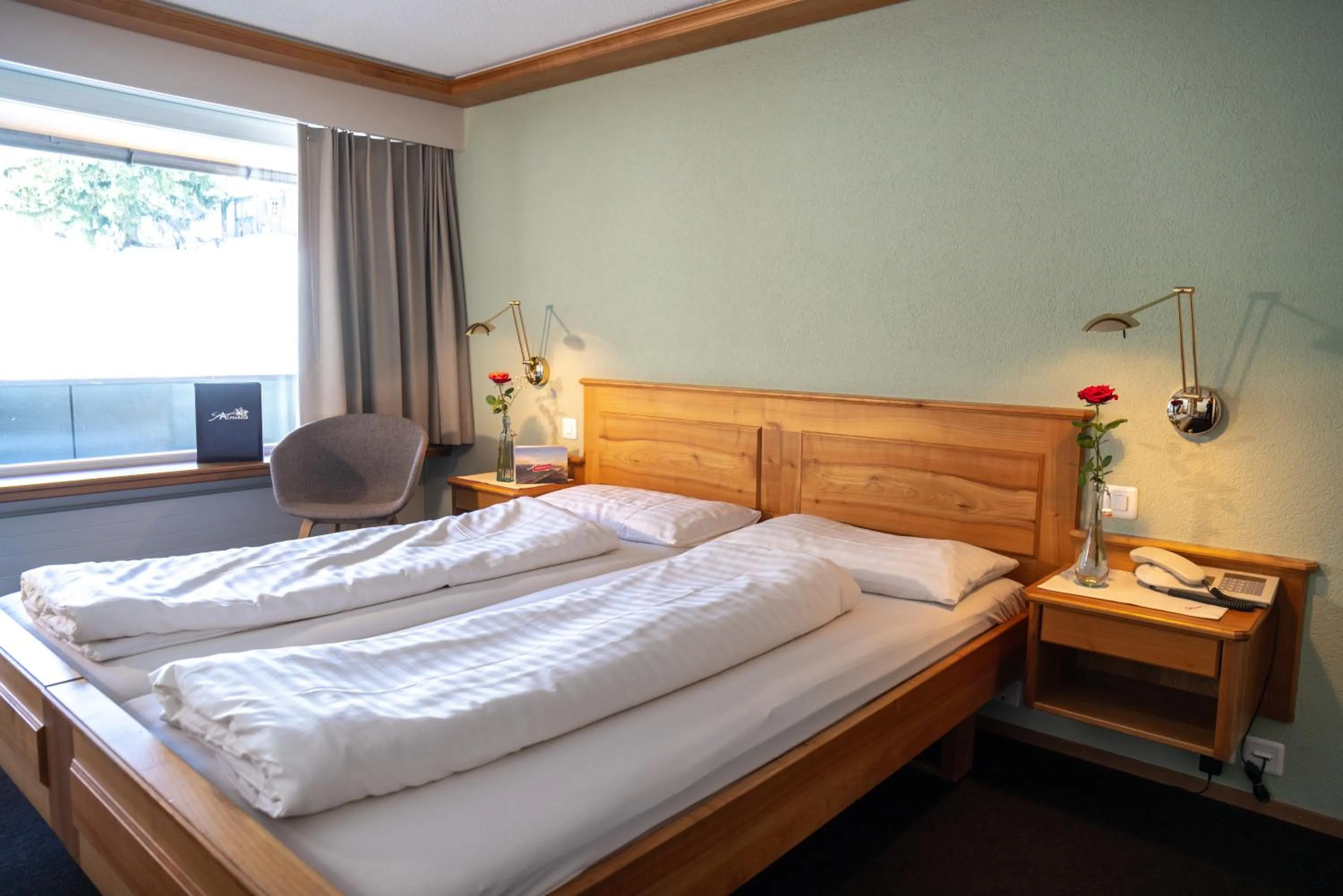 Bed in Hotel Stump's Alpenrose