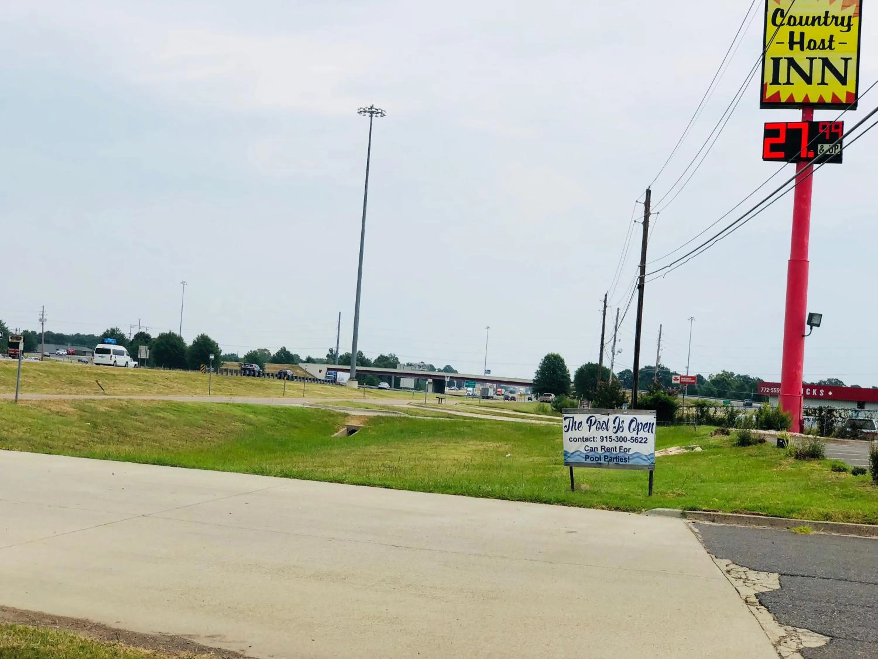 Property logo or sign in Country Host Inn