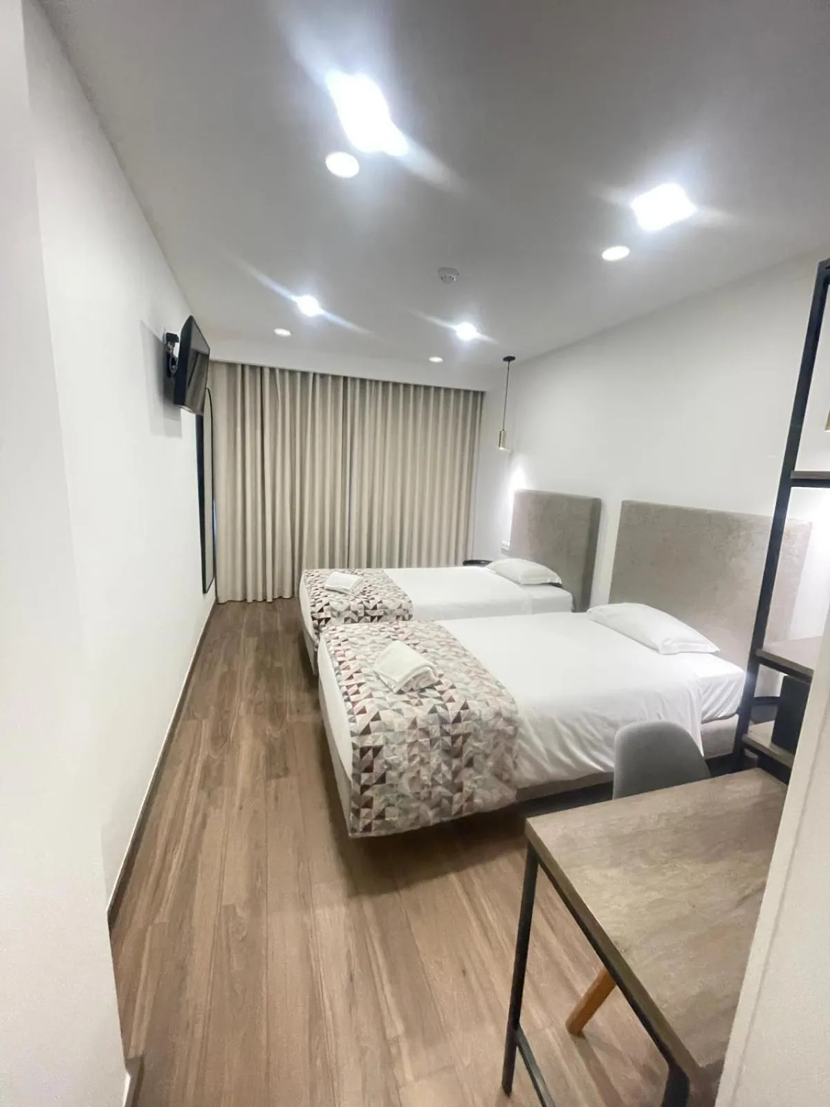 Bed in Hotel Flamingo