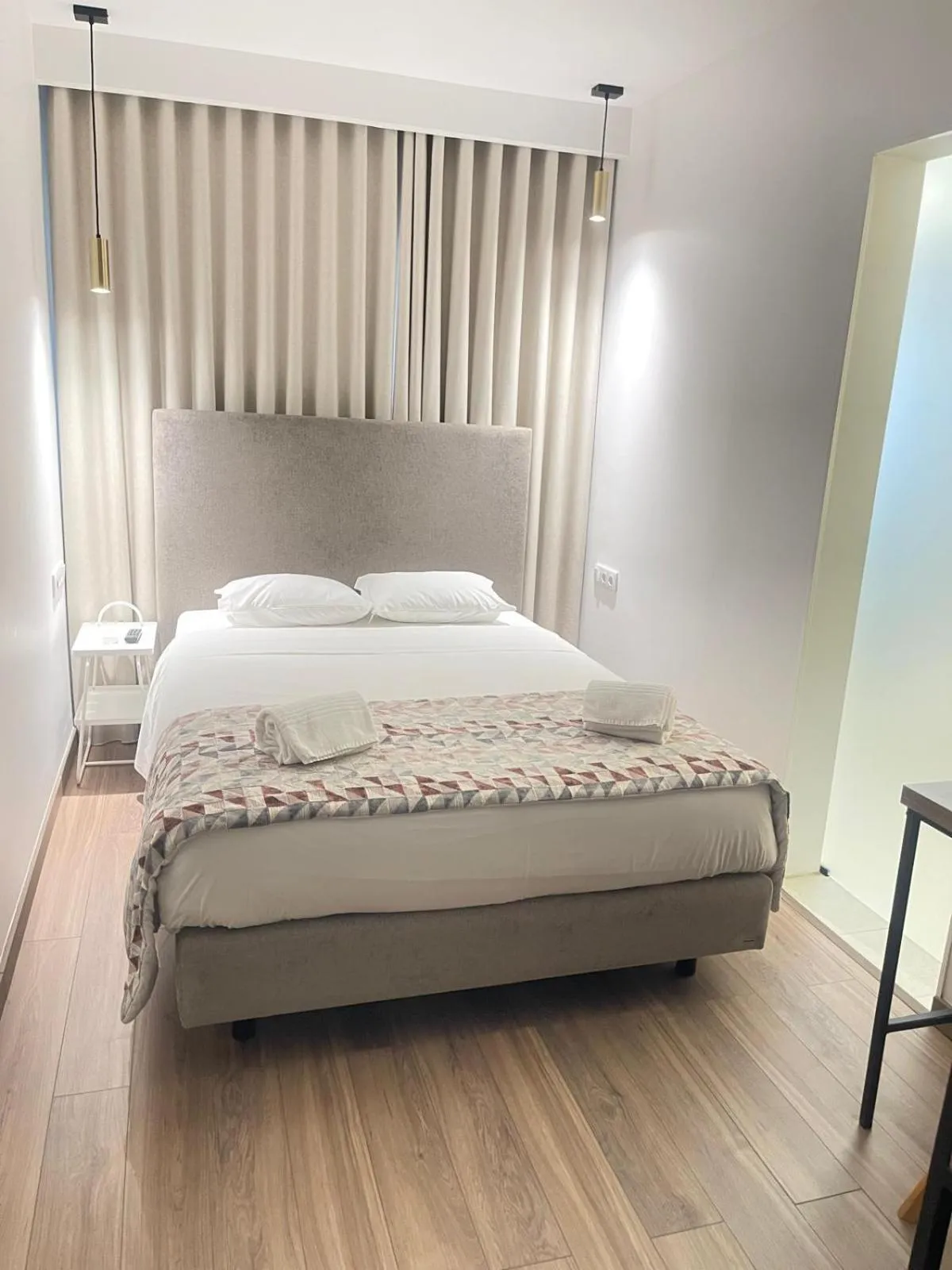 Bed in Hotel Flamingo