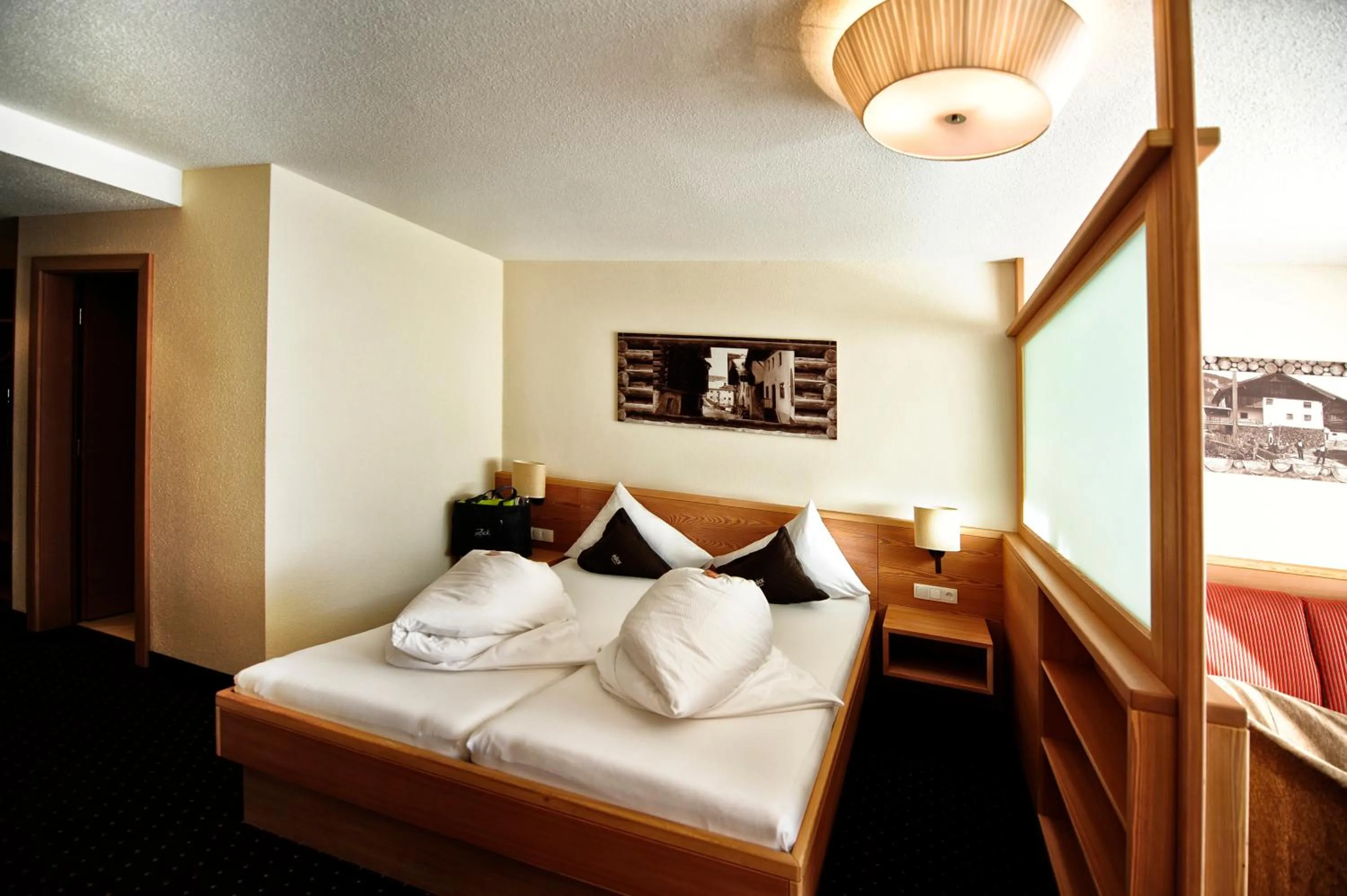 Photo of the whole room, Bed in Hotel Röck Garni