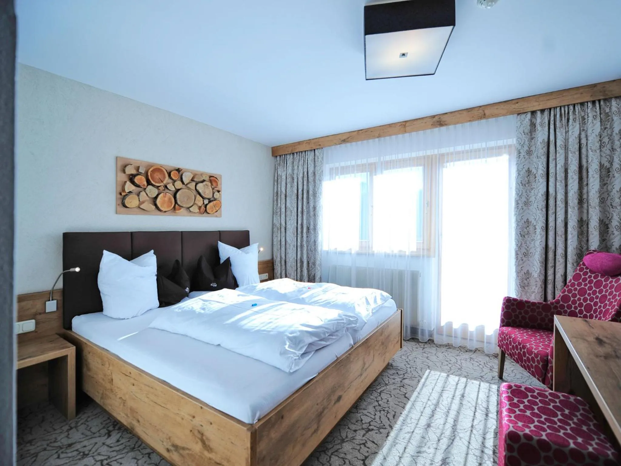 Photo of the whole room, Bed in Hotel Röck Garni