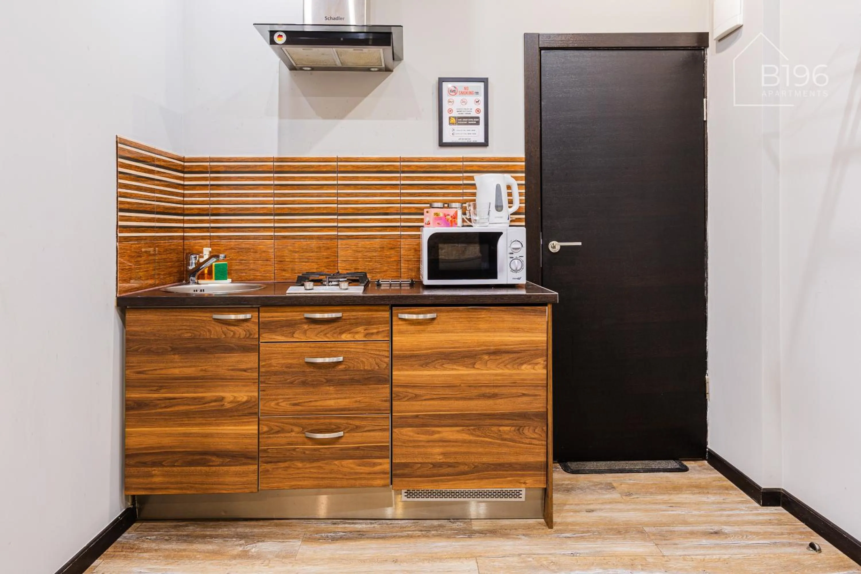 kitchen in ApartHotel Riga