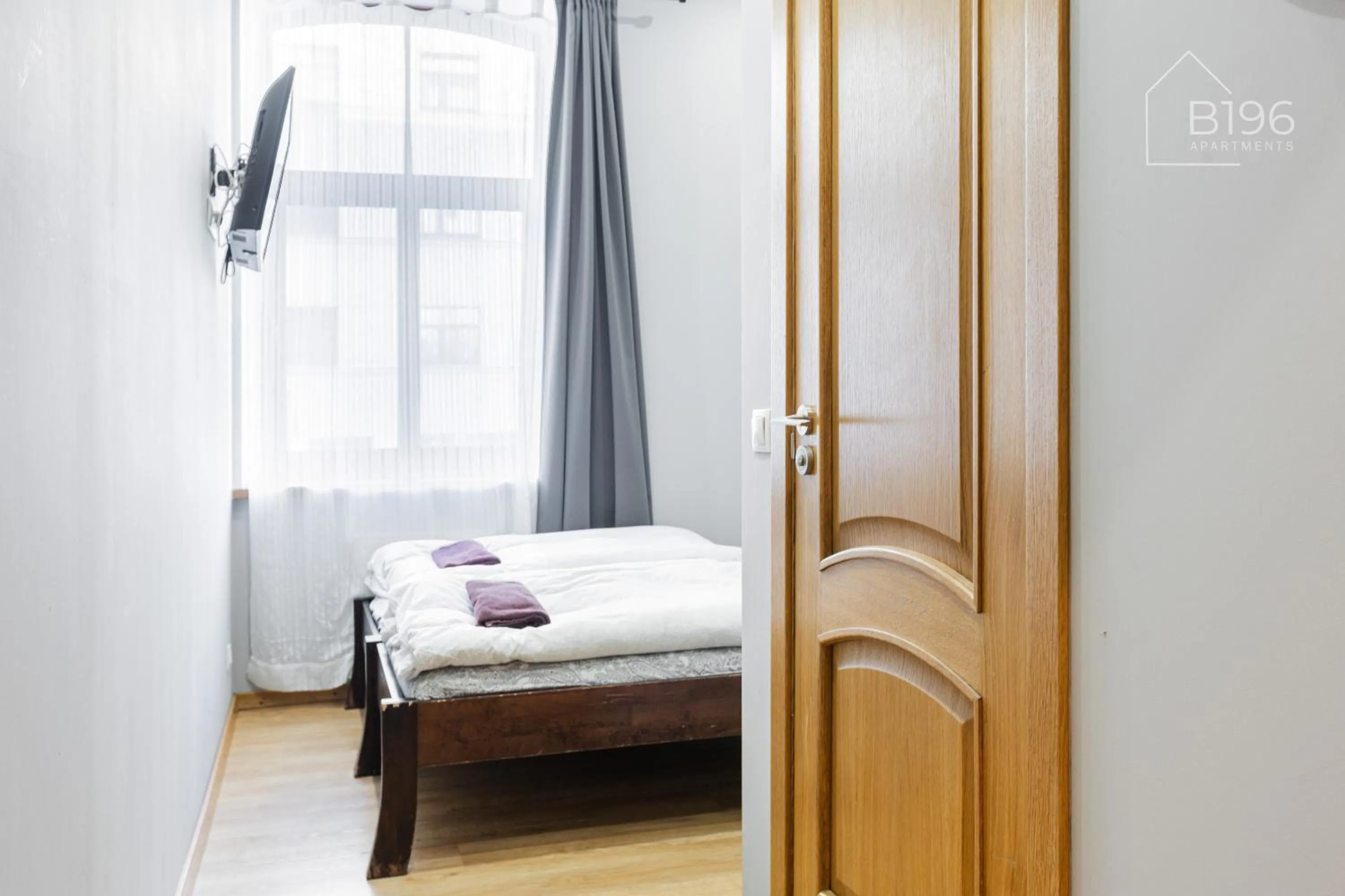 Photo of the whole room, Bed in ApartHotel Riga