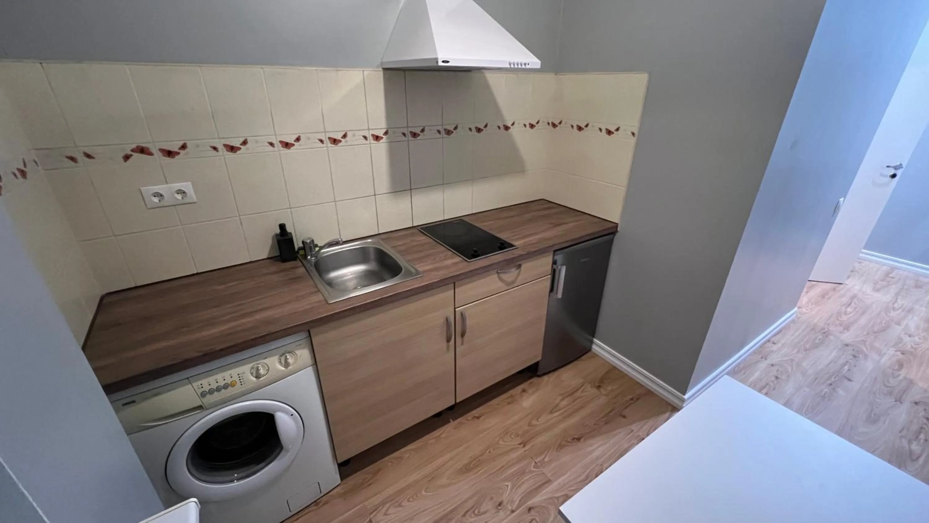 Kitchen or kitchenette in ApartHotel Riga