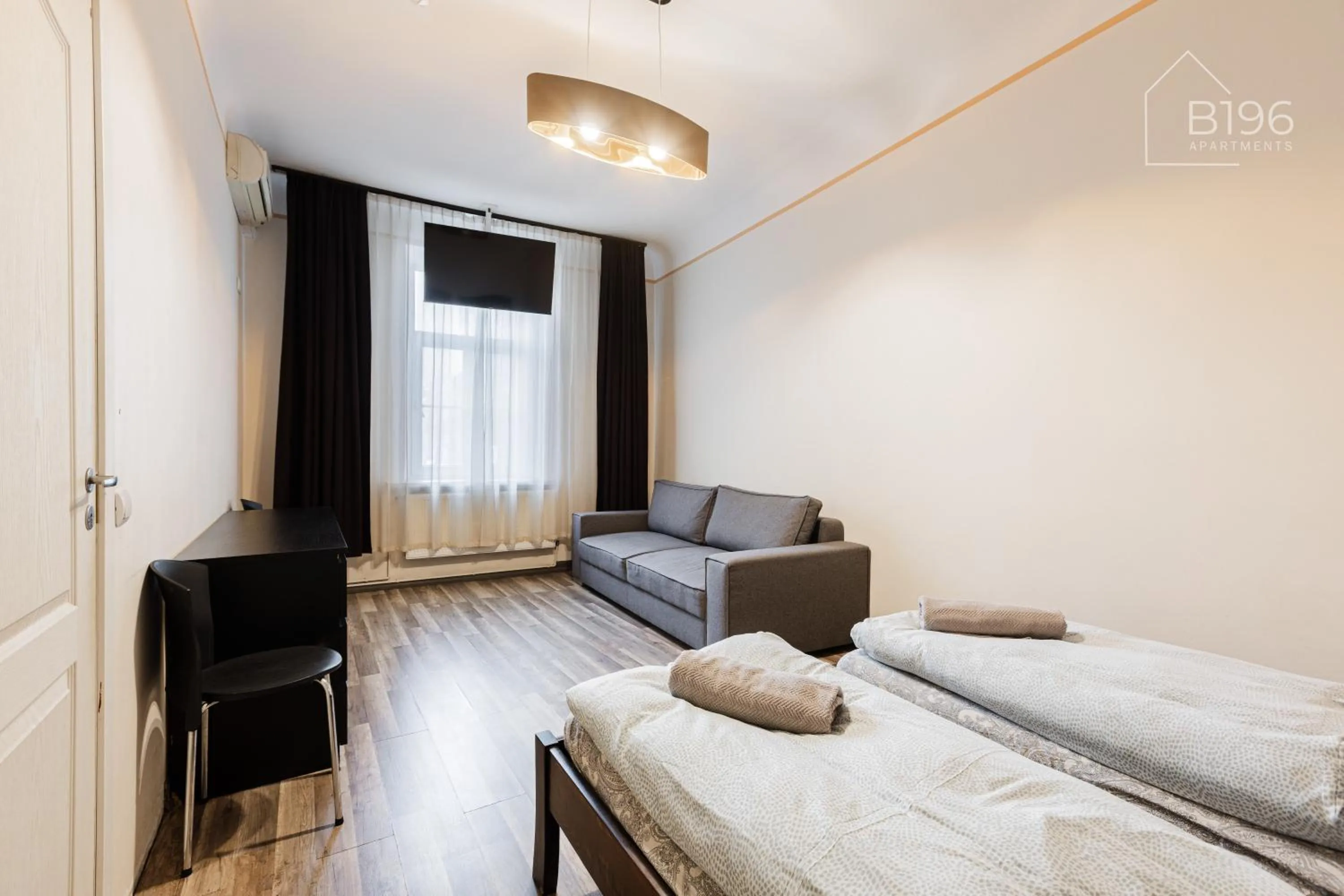 Photo of the whole room, Bed in ApartHotel Riga