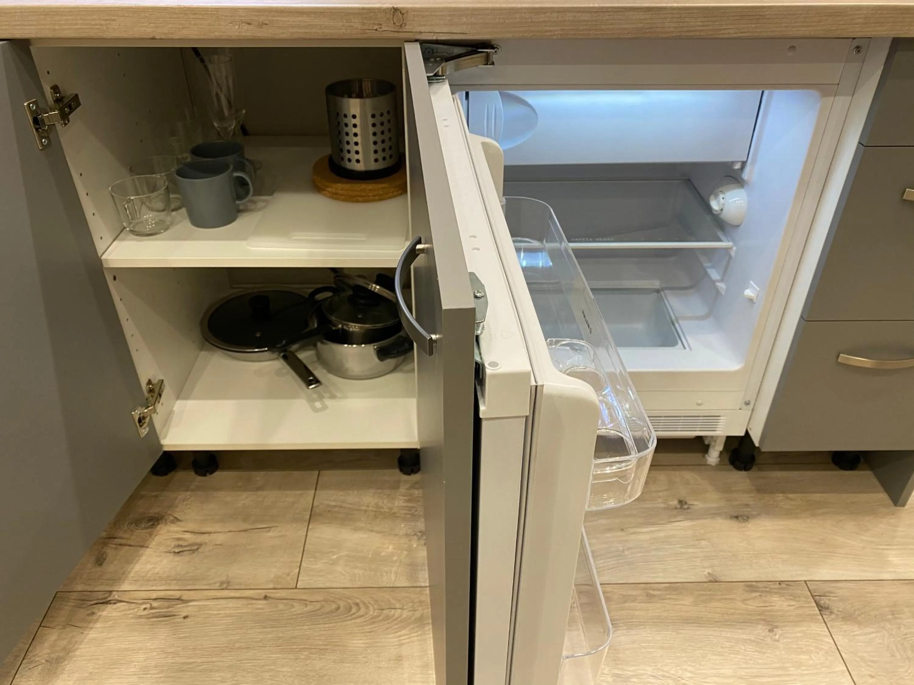 Kitchen or kitchenette in ApartHotel Riga