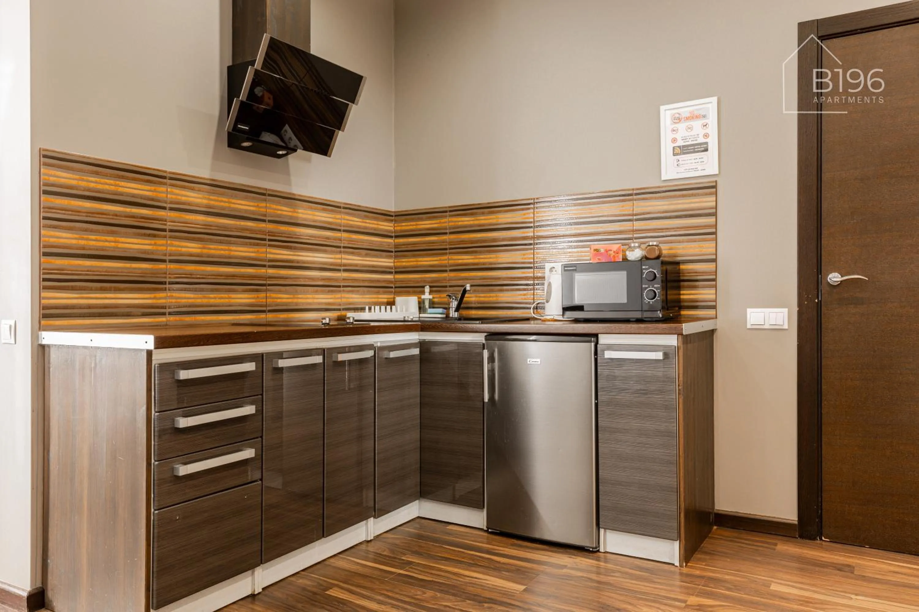 kitchen in ApartHotel Riga