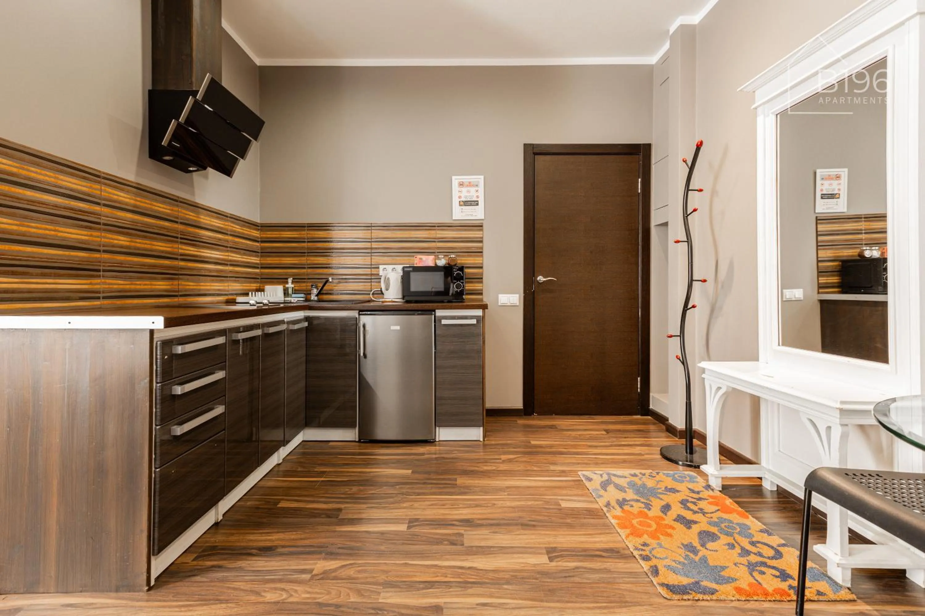 kitchen in ApartHotel Riga