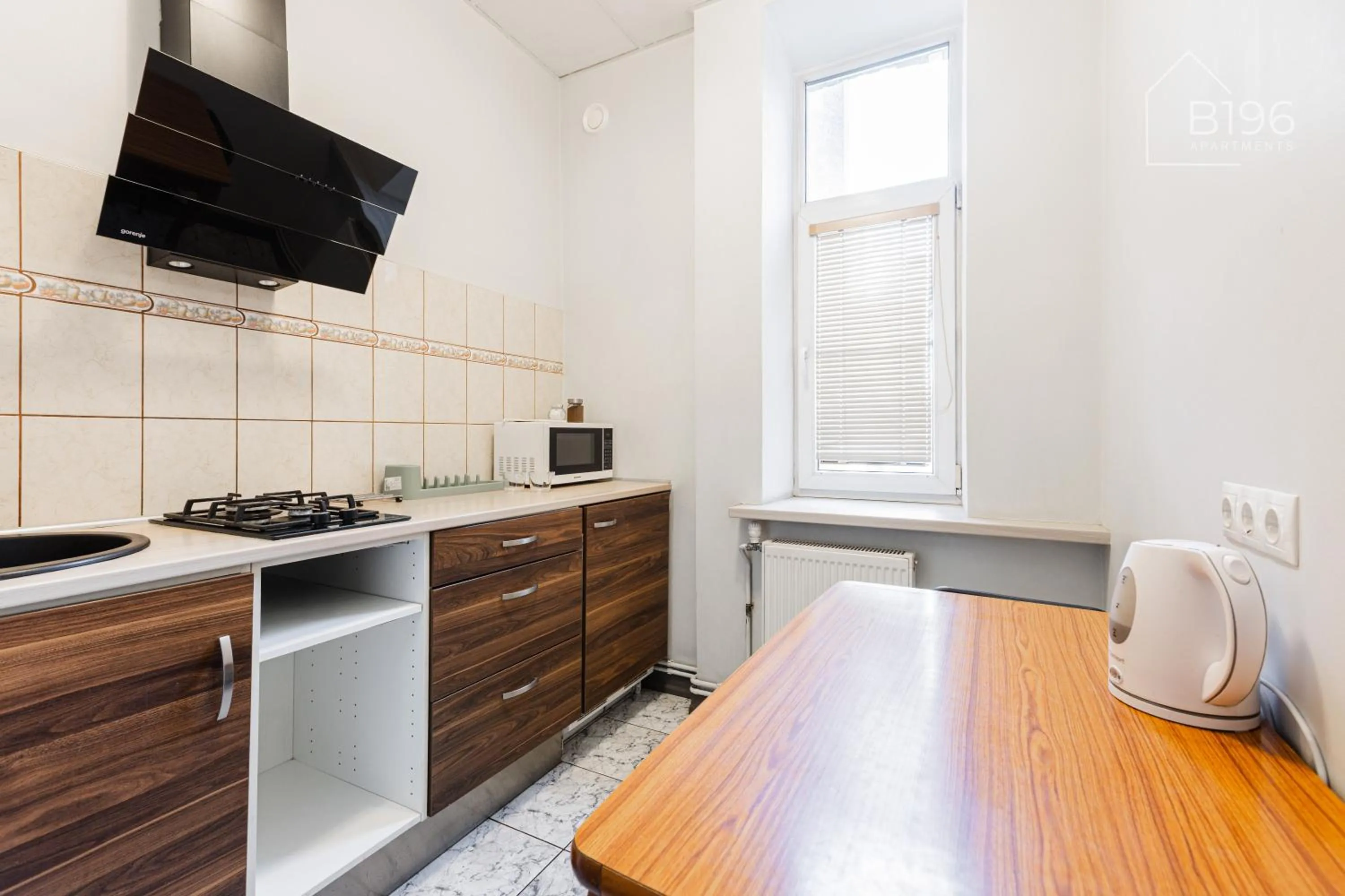 kitchen in ApartHotel Riga