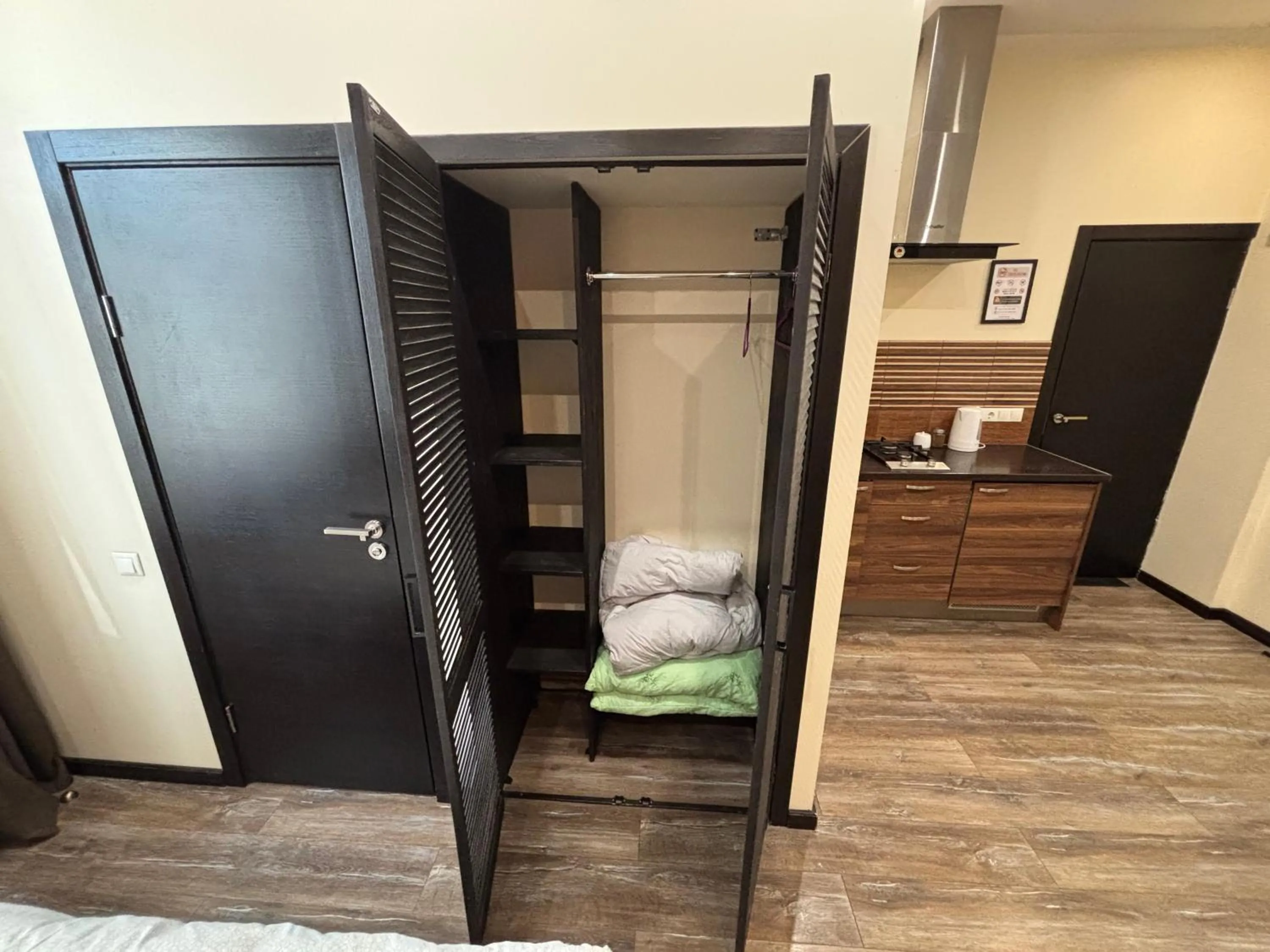 wardrobe, Bed in ApartHotel Riga