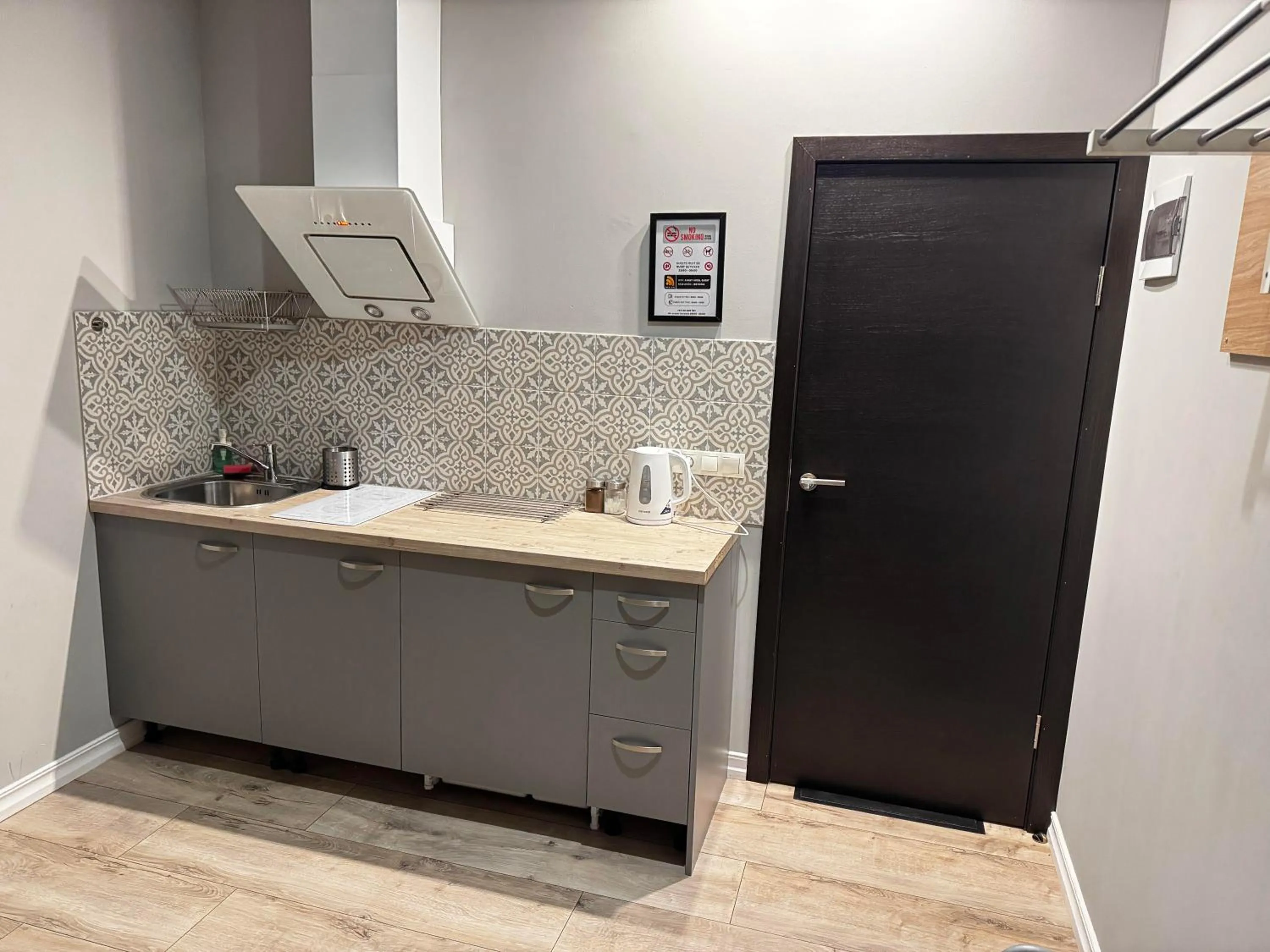 Kitchen or kitchenette in ApartHotel Riga