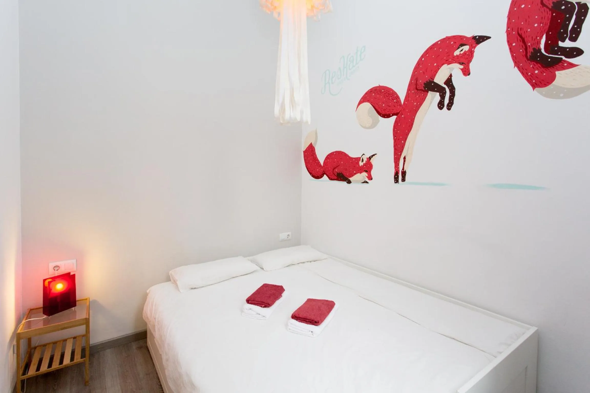 Bed in ZOOROOMS Boutique Guesthouse