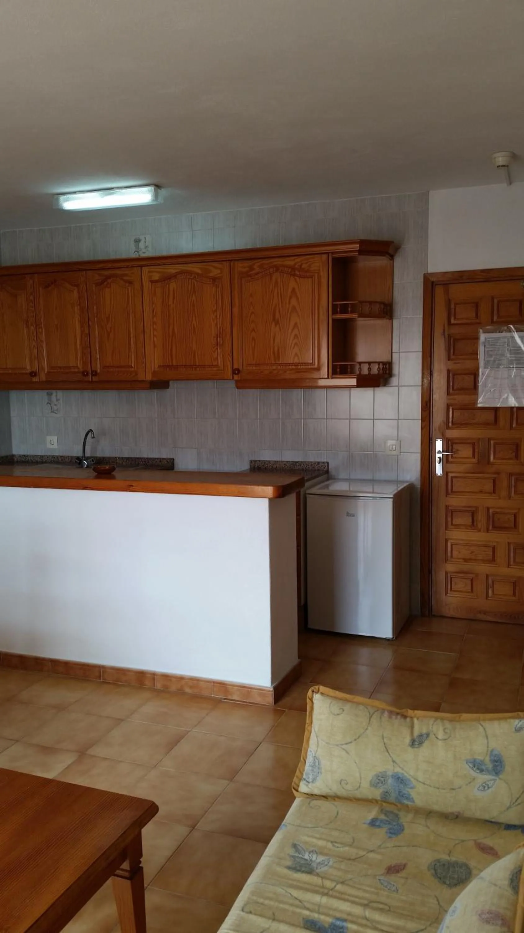 Kitchen or kitchenette in Apartamentos Vista al Puerto