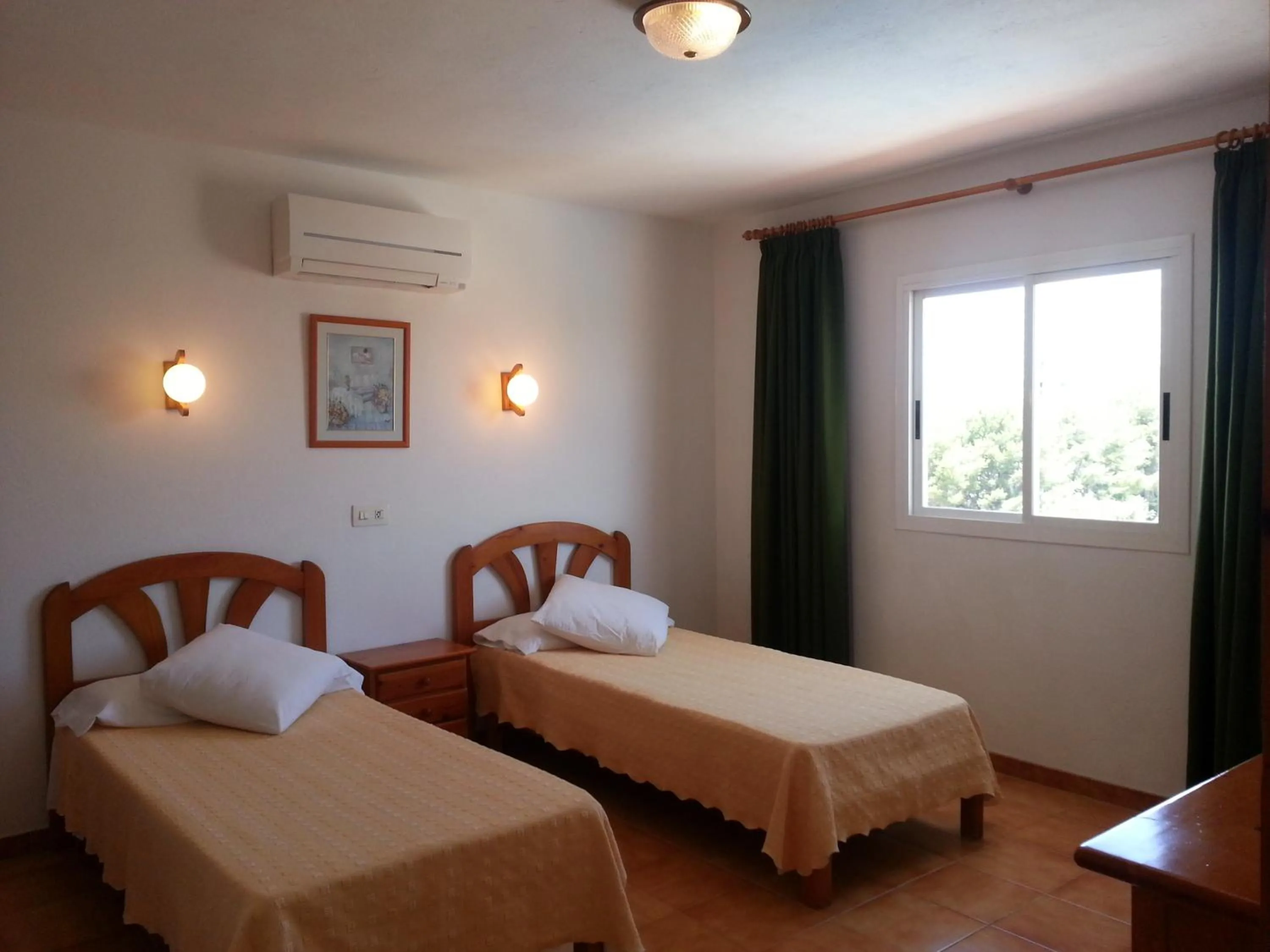 Bedroom, Bed in Apartamentos Vista al Puerto
