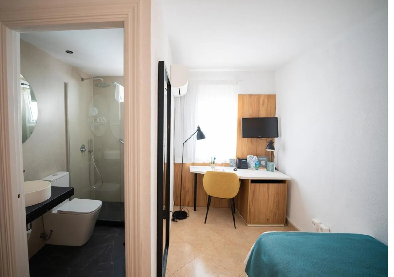 Bedroom in Alfons Hotel