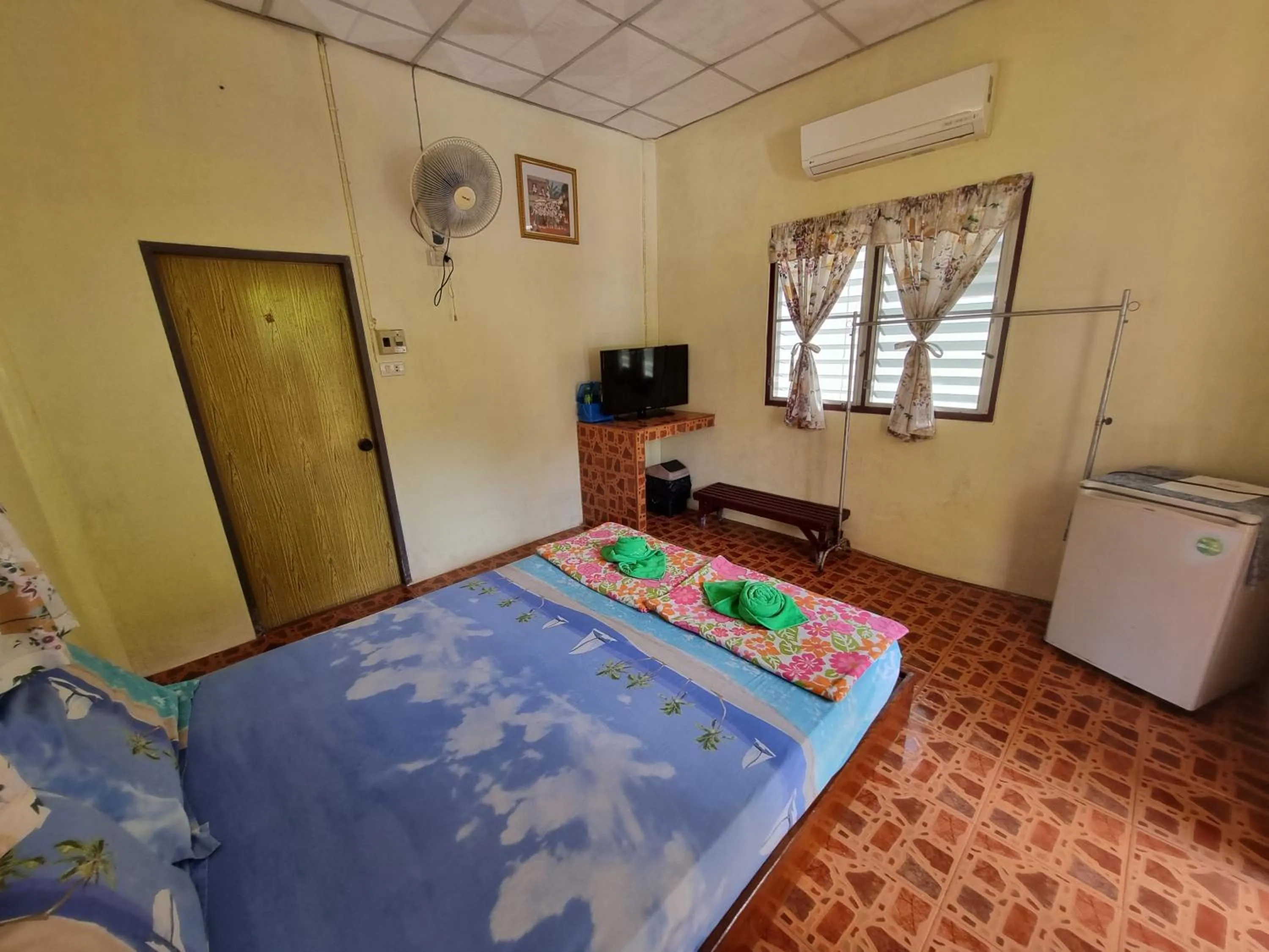 Bed in Day Night Bangalows